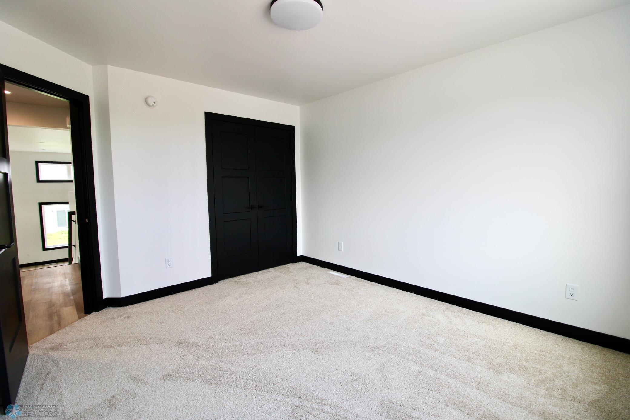2025 single family home for sale at 6721 67th Avenue S in Horace, ND — 4 bed, 3 bath (photo 16 of 30)