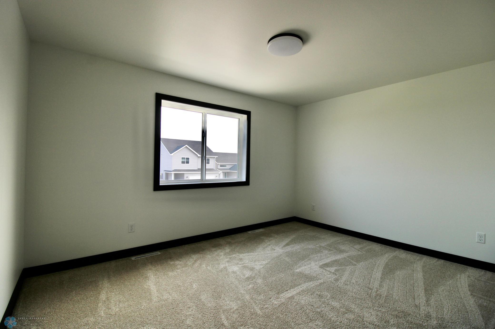2025 single family home for sale at 6721 67th Avenue S in Horace, ND — 4 bed, 3 bath (photo 17 of 30)