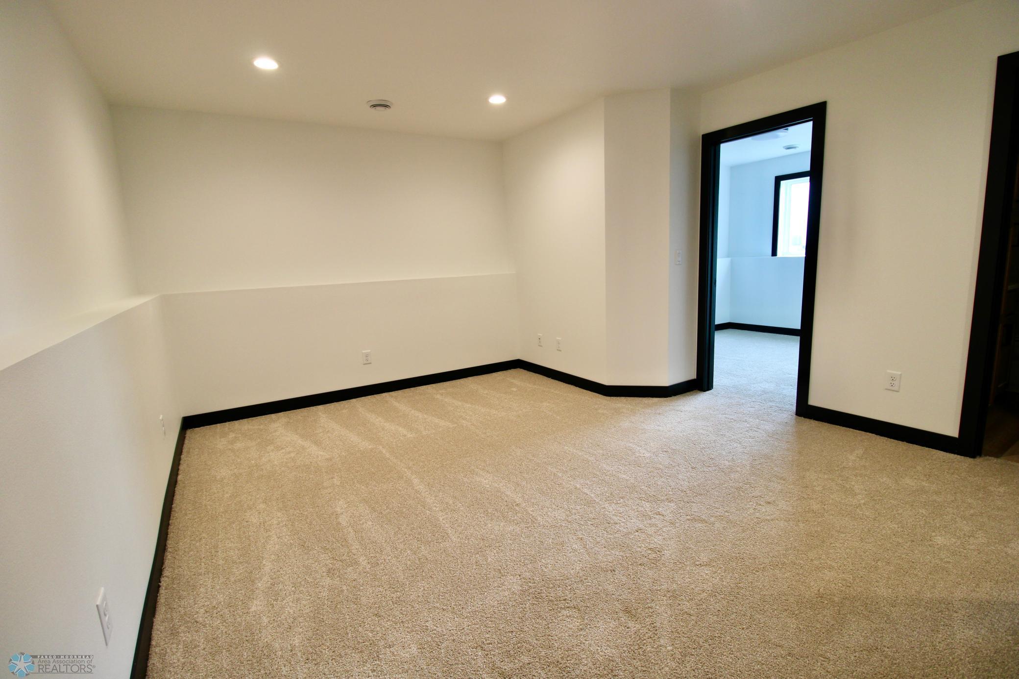 2025 single family home for sale at 6721 67th Avenue S in Horace, ND — 4 bed, 3 bath (photo 24 of 30)