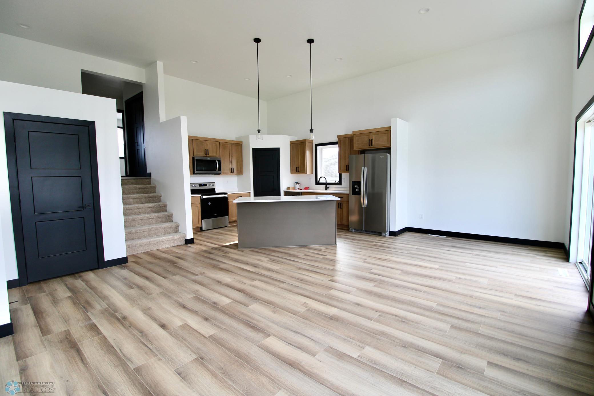2025 single family home for sale at 6721 67th Avenue S in Horace, ND — 4 bed, 3 bath (photo 6 of 30)