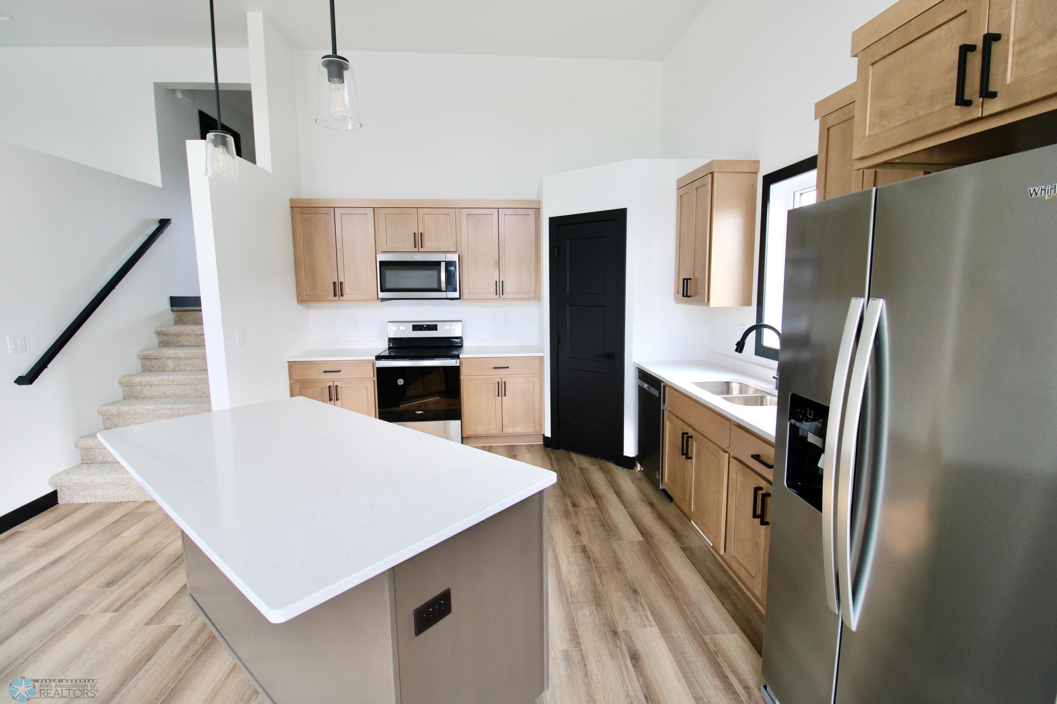 2025 single family home for sale at 6721 67th Avenue S in Horace, ND — 4 bed, 3 bath (photo 7 of 30)