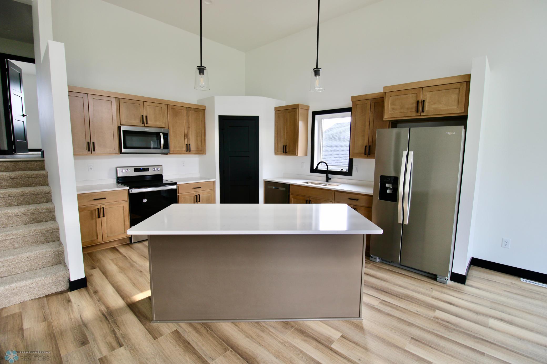 2025 single family home for sale at 6721 67th Avenue S in Horace, ND — 4 bed, 3 bath (photo 8 of 30)