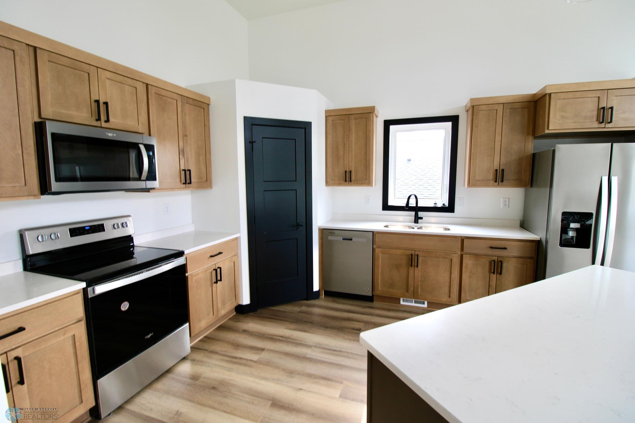 2025 single family home for sale at 6721 67th Avenue S in Horace, ND — 4 bed, 3 bath (photo 9 of 30)
