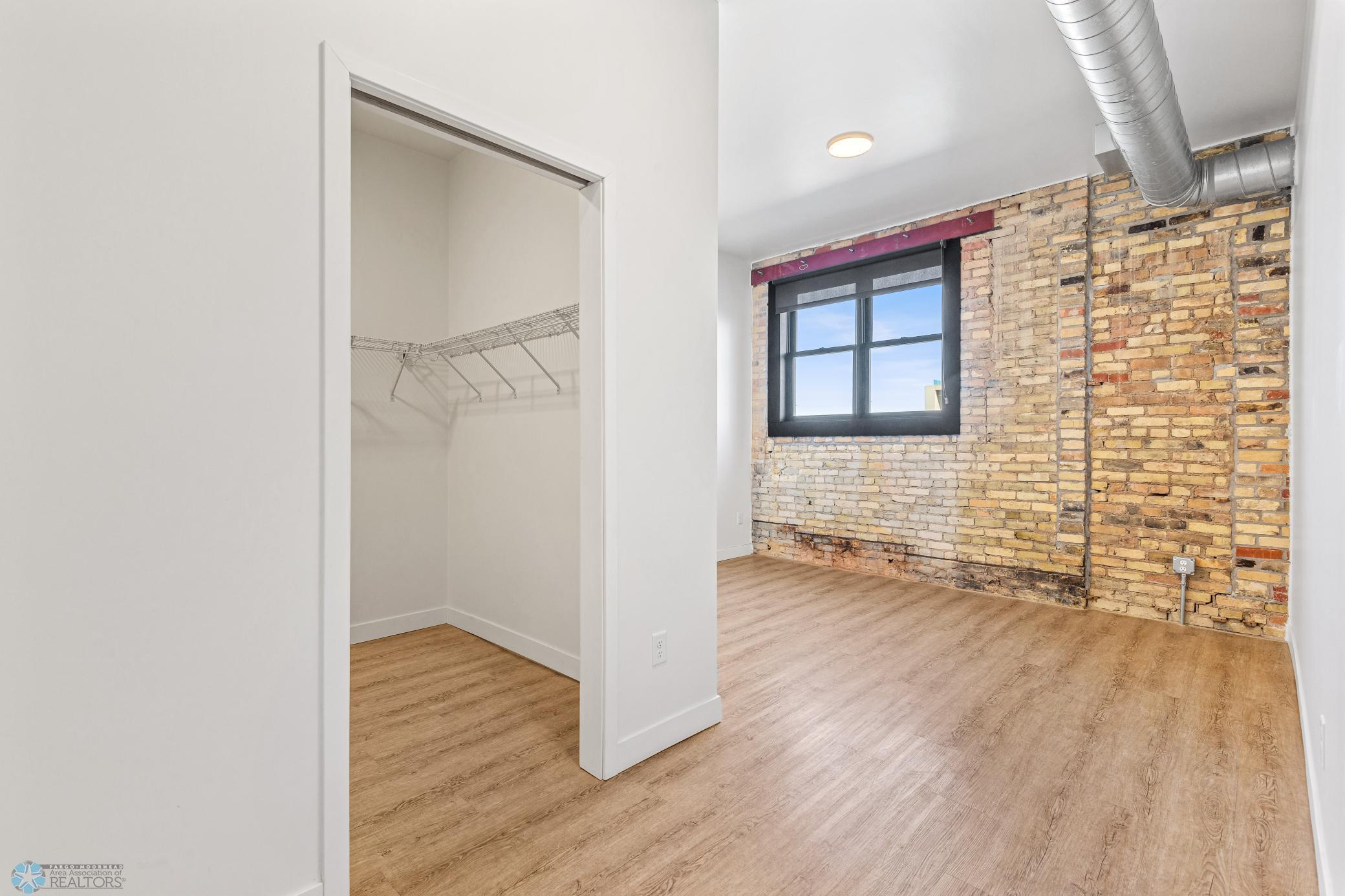 1911 condo for sale at 117 Broadway N, Unit 308 in Fargo, ND — 3 bed, 2 bath (photo 14 of 61)