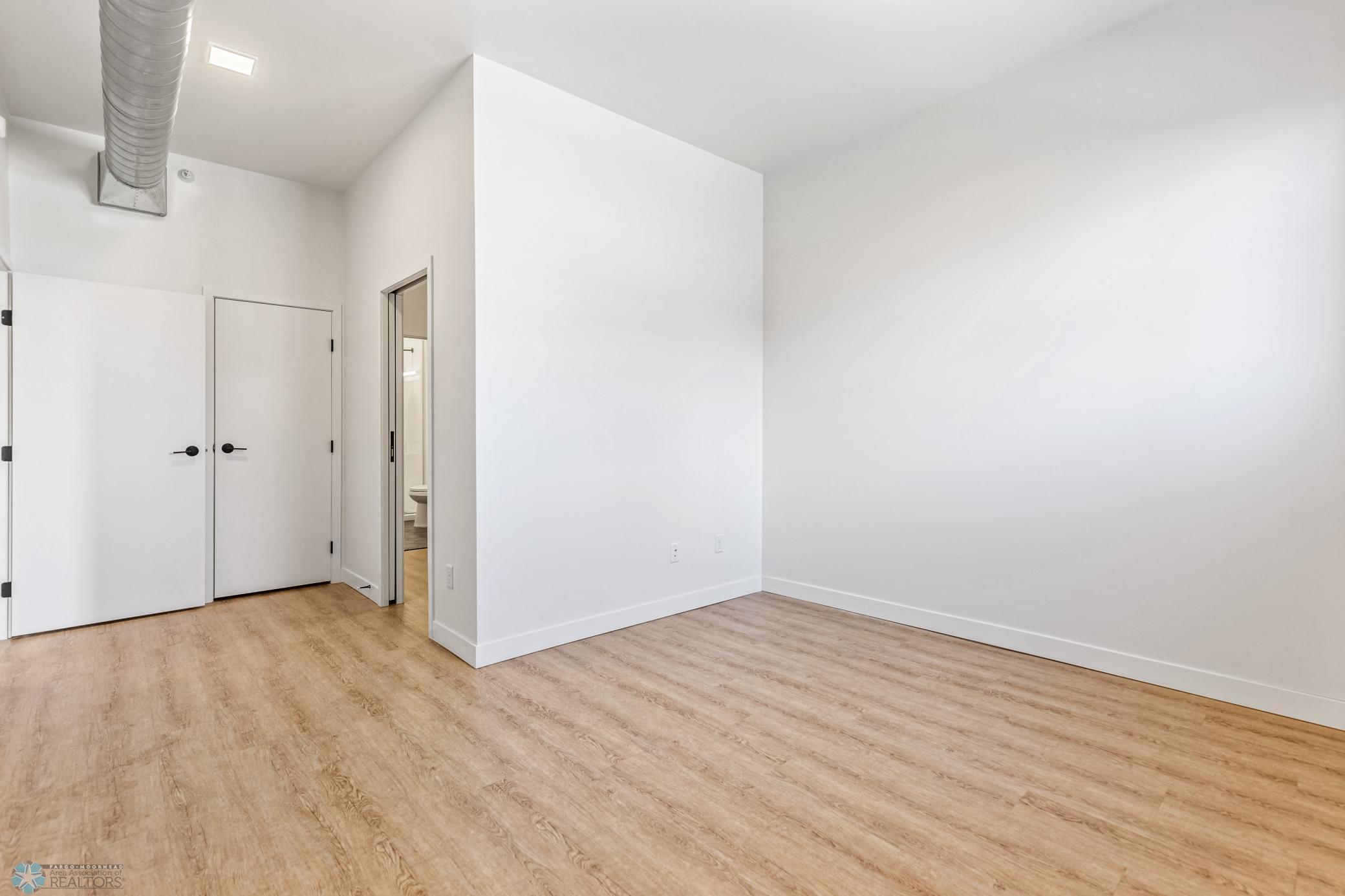 1911 condo for sale at 117 Broadway N, Unit 308 in Fargo, ND — 3 bed, 2 bath (photo 16 of 61)