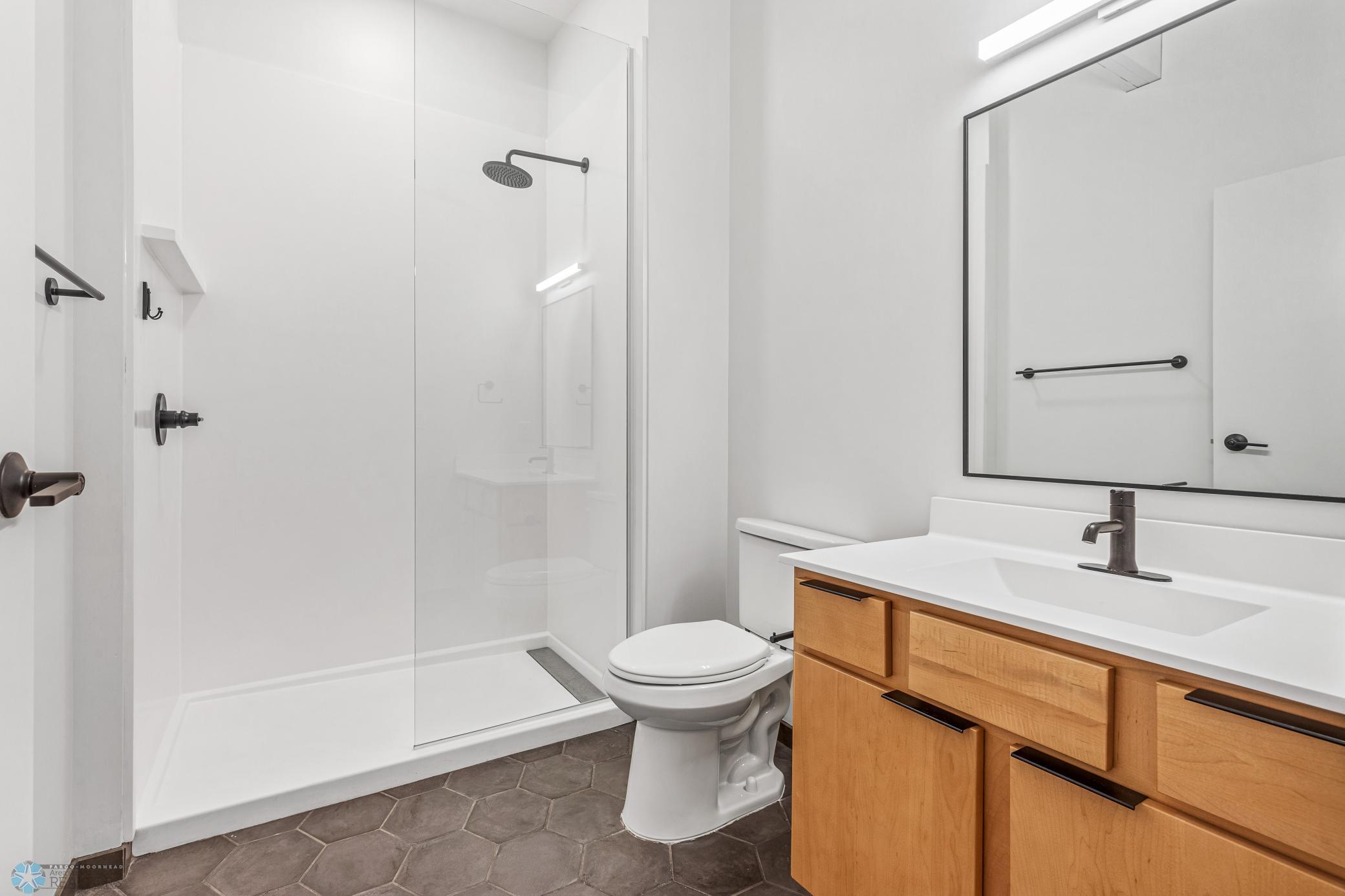 1911 condo for sale at 117 Broadway N, Unit 308 in Fargo, ND — 3 bed, 2 bath (photo 18 of 61)