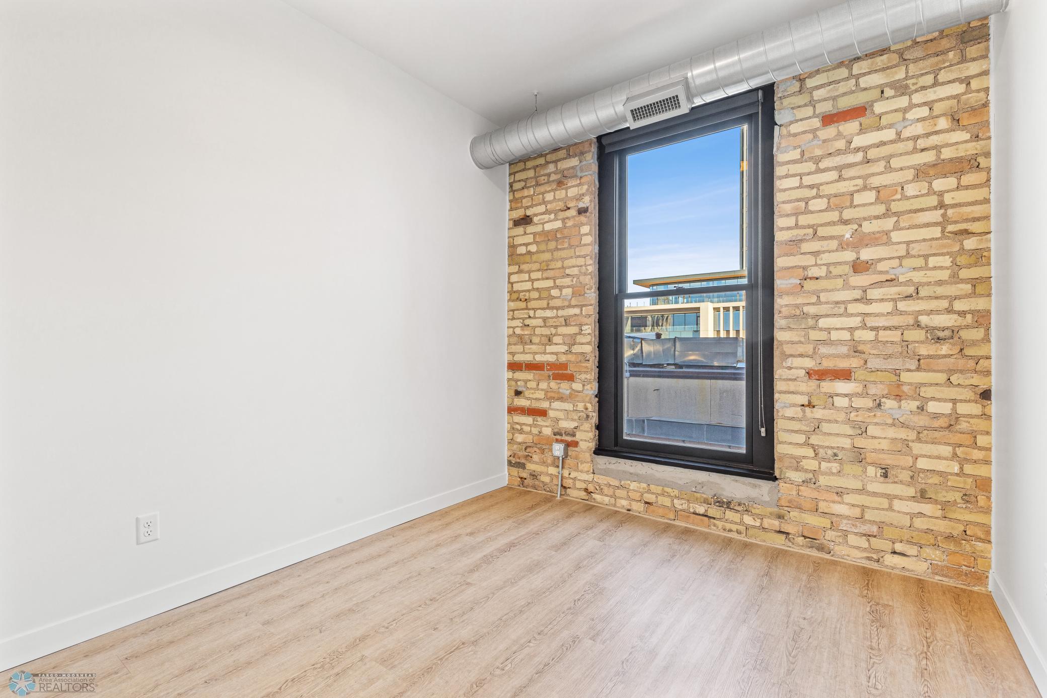 1911 condo for sale at 117 Broadway N, Unit 308 in Fargo, ND — 3 bed, 2 bath (photo 20 of 61)