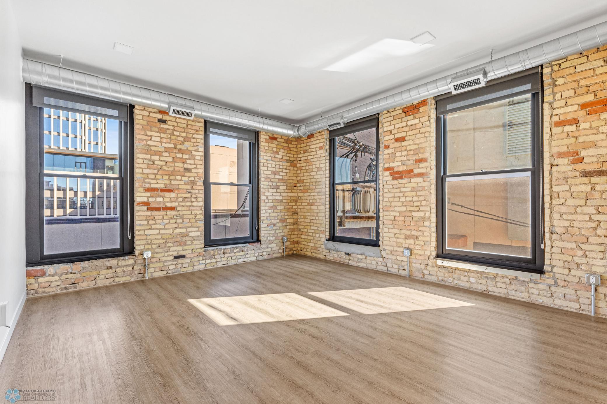 1911 condo for sale at 117 Broadway N, Unit 308 in Fargo, ND — 3 bed, 2 bath (photo 3 of 61)