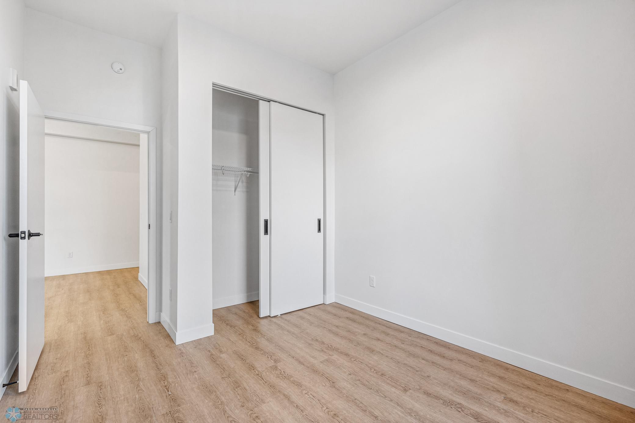 1911 condo for sale at 117 Broadway N, Unit 308 in Fargo, ND — 3 bed, 2 bath (photo 21 of 61)