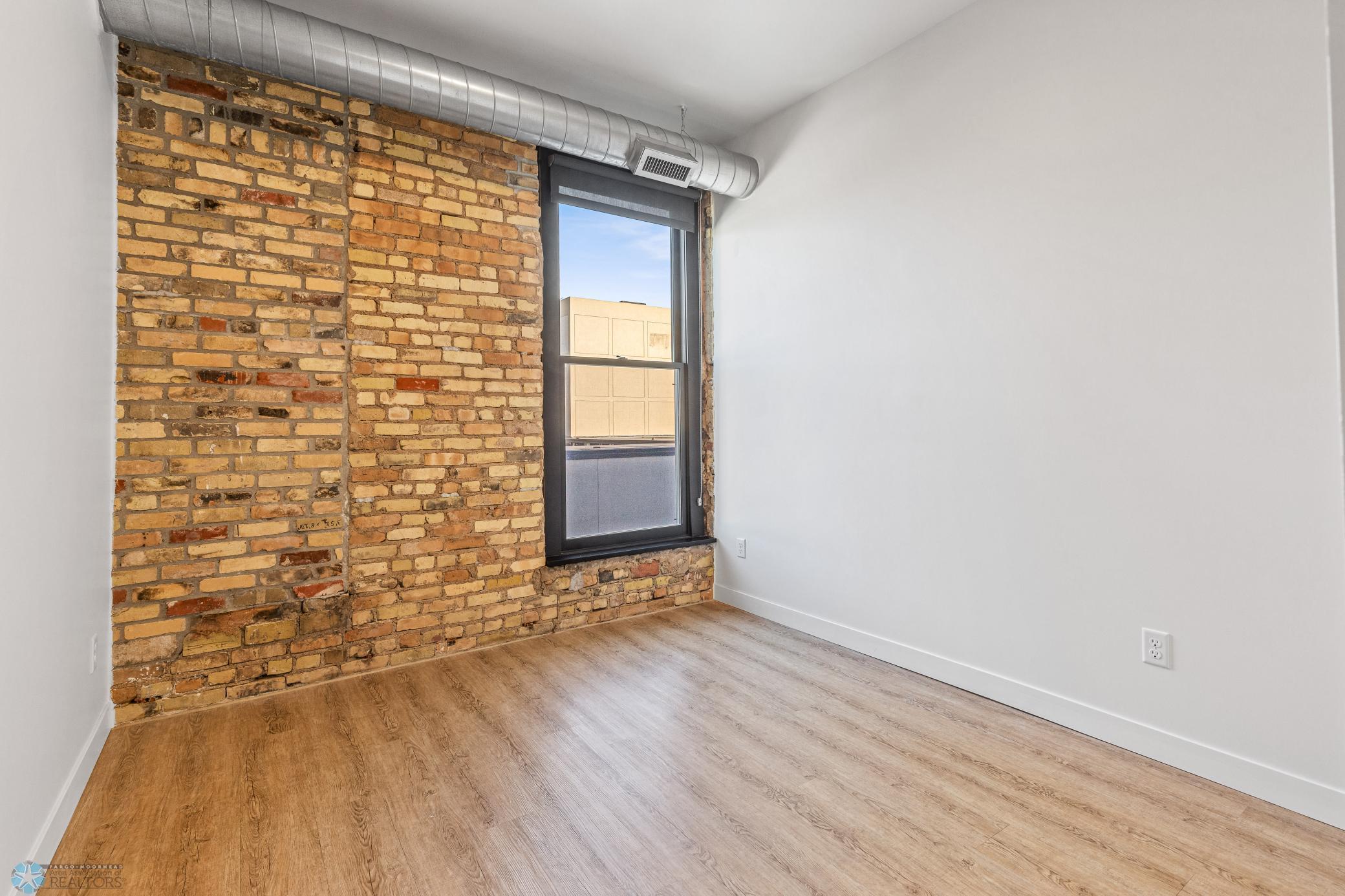 1911 condo for sale at 117 Broadway N, Unit 308 in Fargo, ND — 3 bed, 2 bath (photo 22 of 61)
