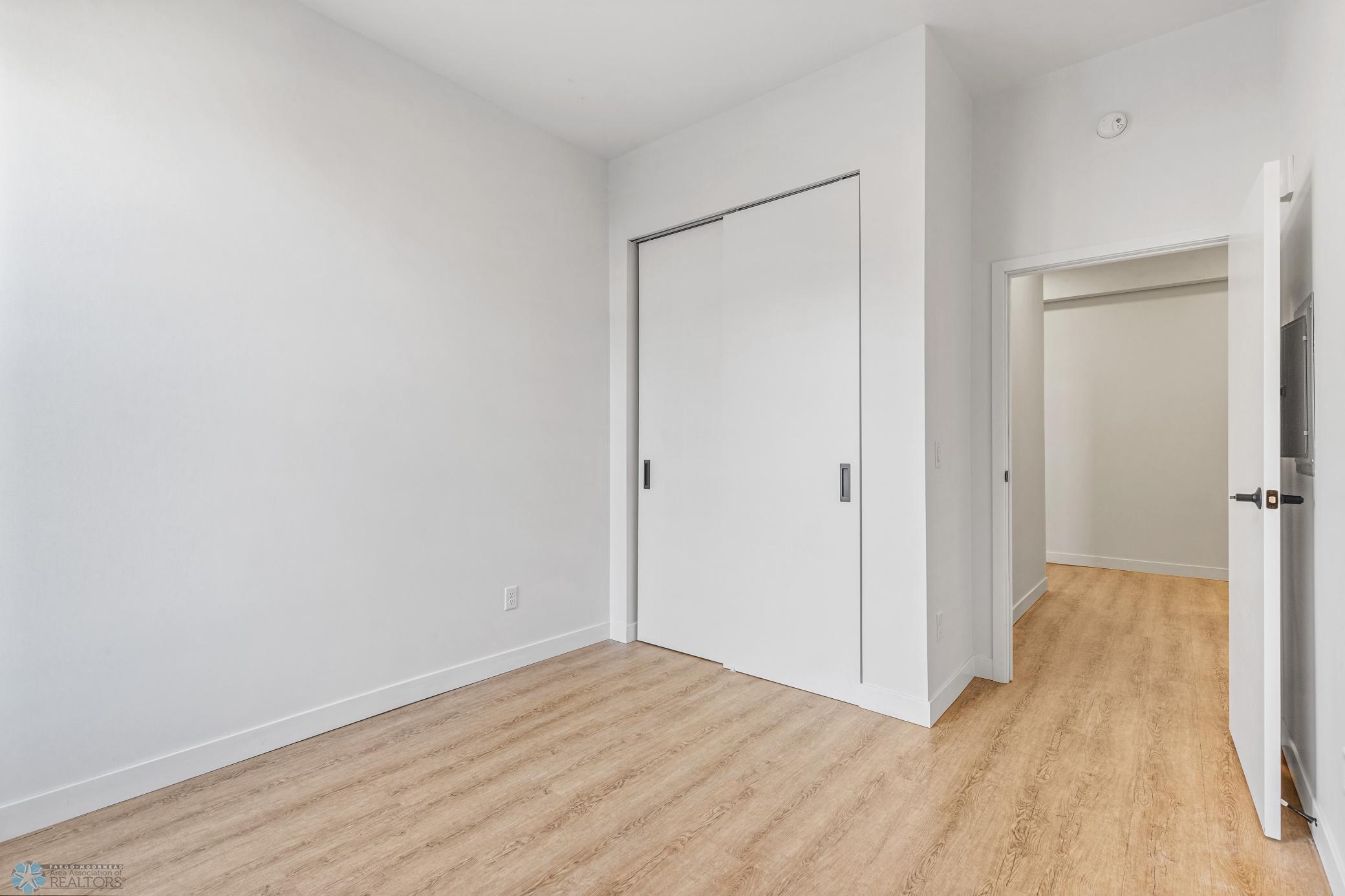 1911 condo for sale at 117 Broadway N, Unit 308 in Fargo, ND — 3 bed, 2 bath (photo 23 of 61)