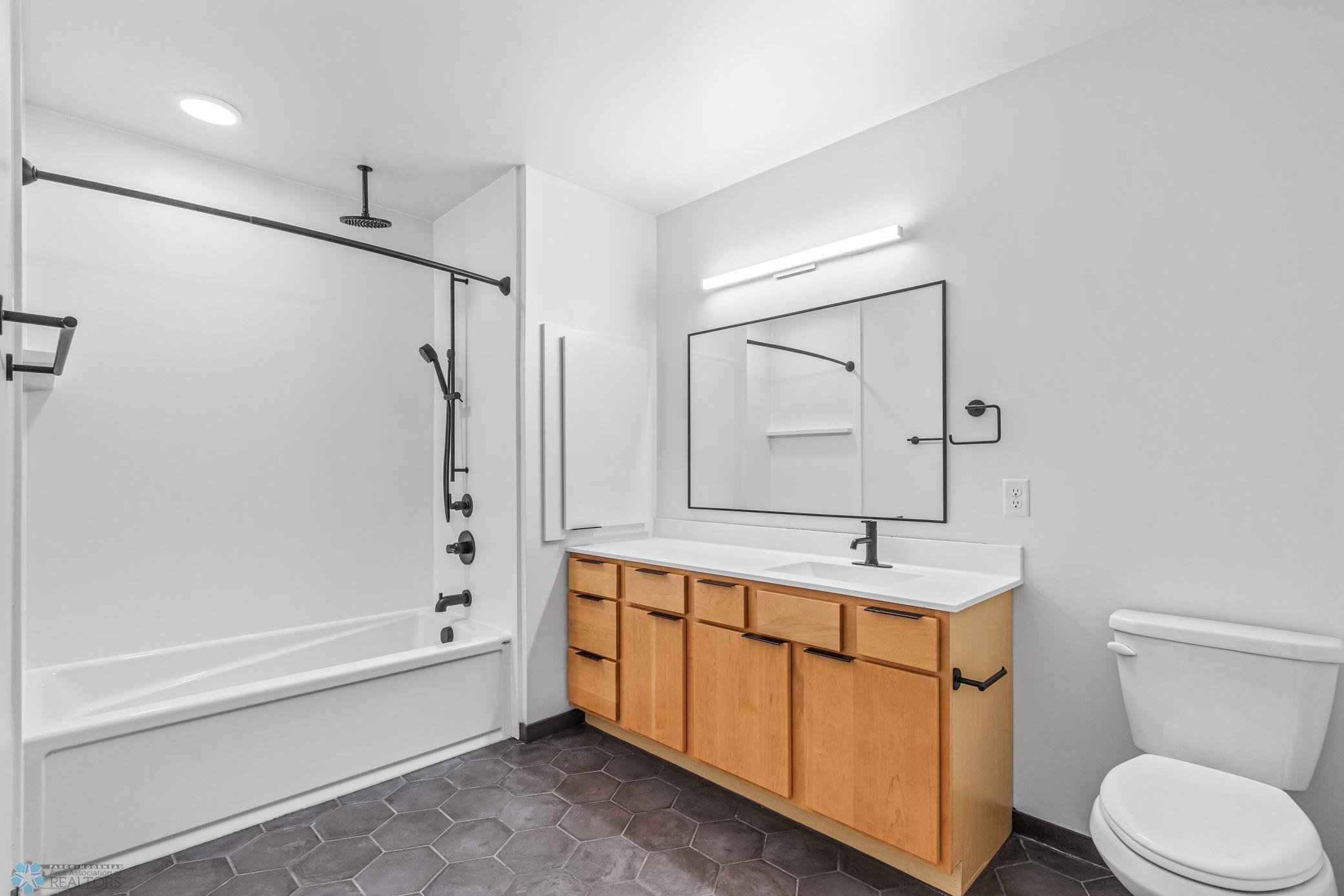 1911 condo for sale at 117 Broadway N, Unit 308 in Fargo, ND — 3 bed, 2 bath (photo 24 of 61)