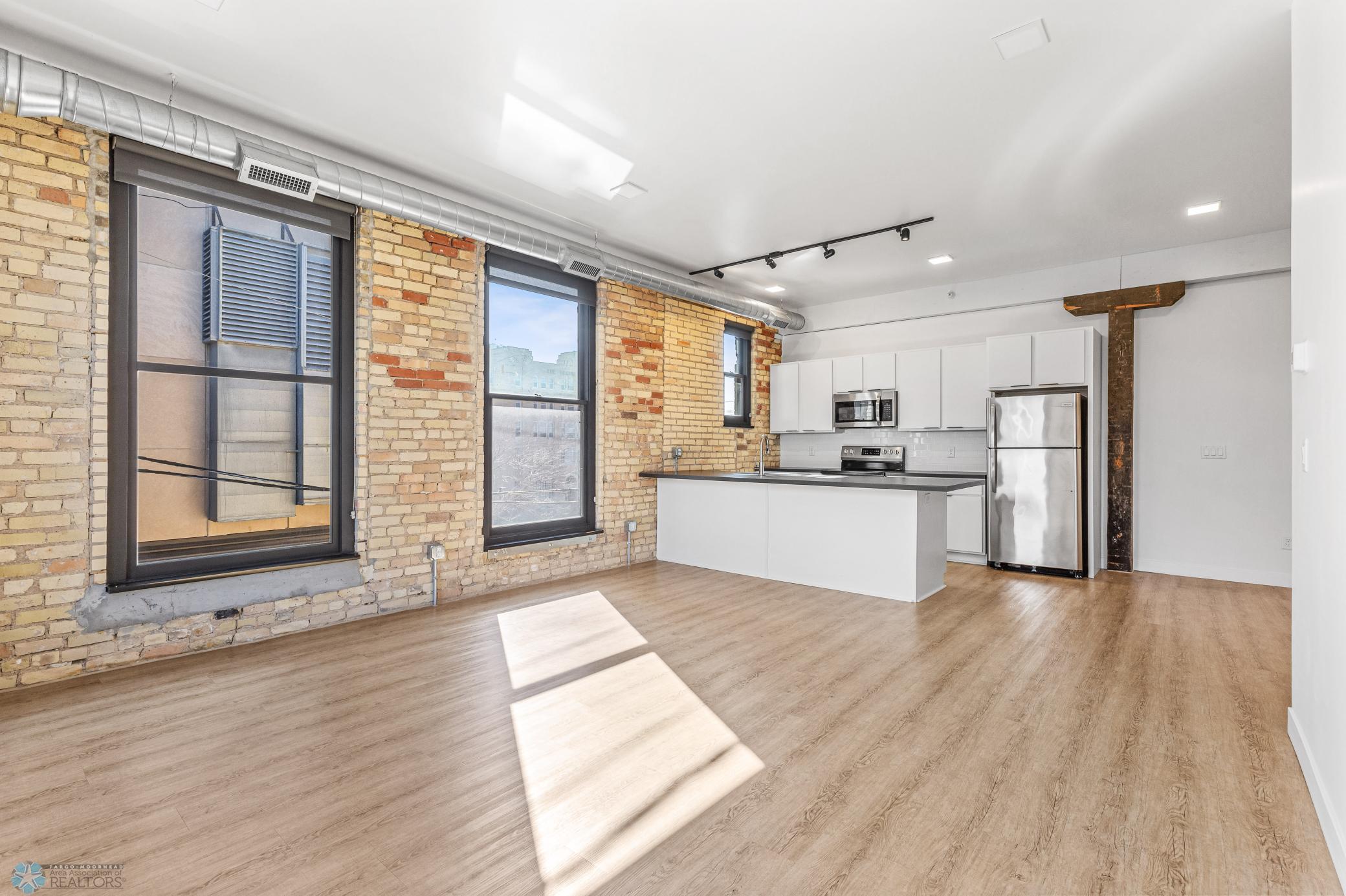 1911 condo for sale at 117 Broadway N, Unit 308 in Fargo, ND — 3 bed, 2 bath (photo 4 of 61)