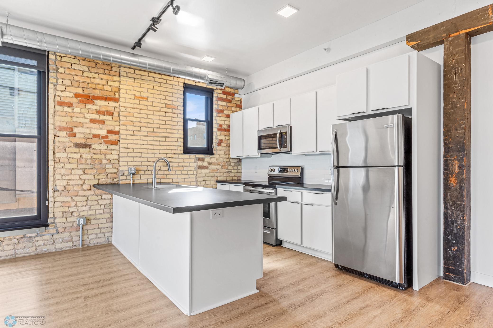 1911 condo for sale at 117 Broadway N, Unit 308 in Fargo, ND — 3 bed, 2 bath (photo 5 of 61)