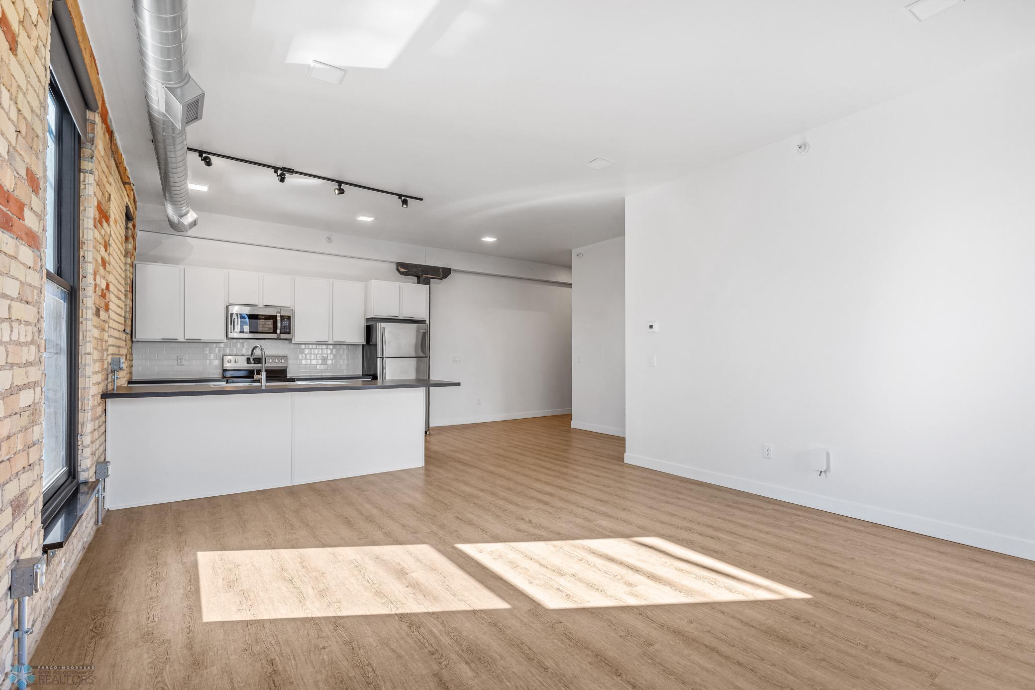 1911 condo for sale at 117 Broadway N, Unit 308 in Fargo, ND — 3 bed, 2 bath (photo 9 of 61)