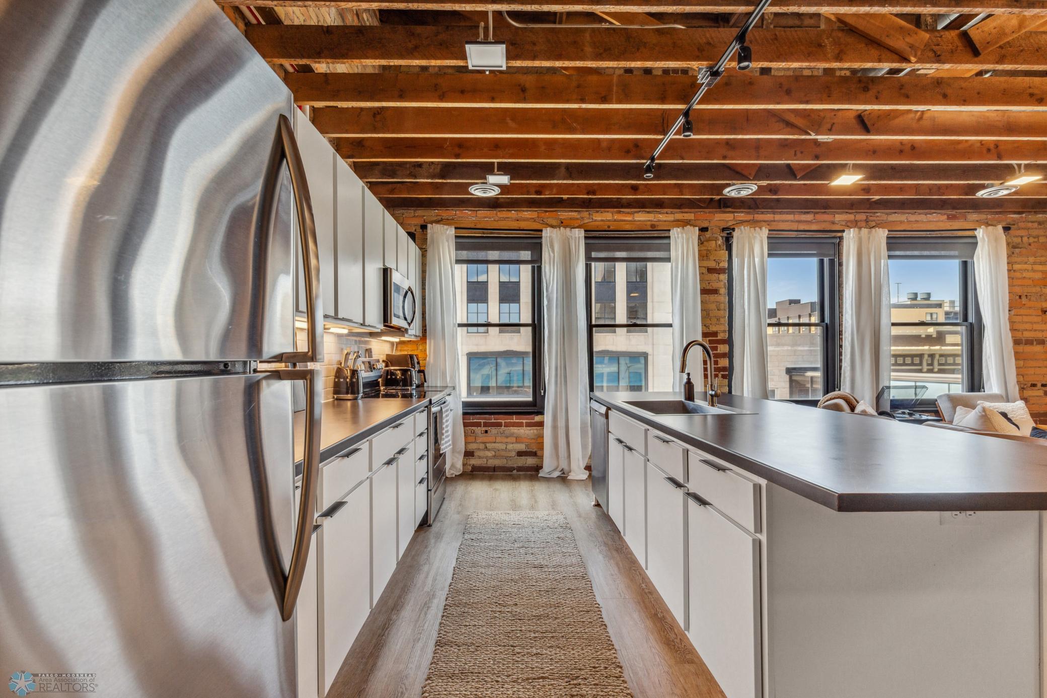 1911 condo for sale at 117 Broadway N, Unit 303 in Fargo, ND — 2 bed, 2 bath (photo 10 of 61)