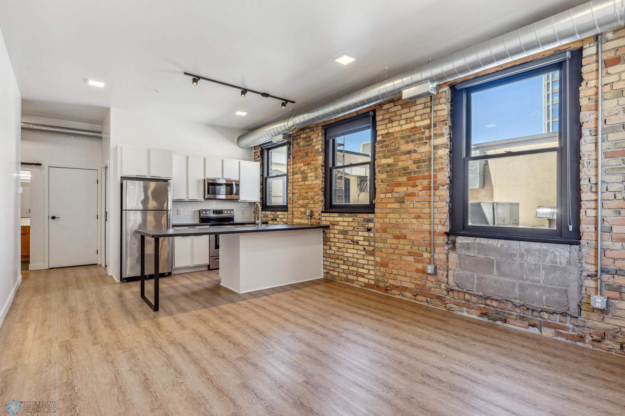 1911 condo for sale at 117 Broadway N, Unit 209 in Fargo, ND — 1 bed, 1 bath (photo 3 of 46)