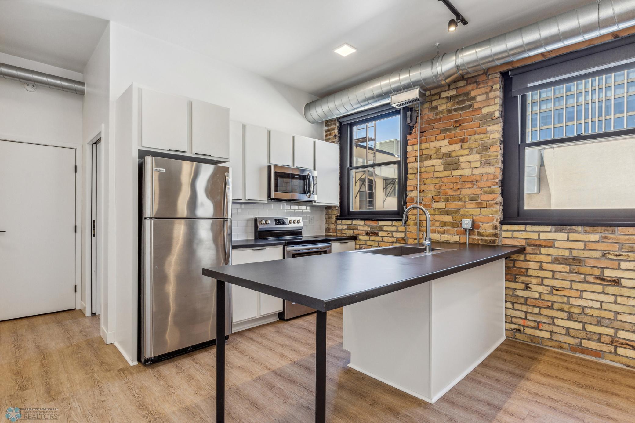 1911 condo for sale at 117 Broadway N, Unit 209 in Fargo, ND — 1 bed, 1 bath (photo 5 of 46)