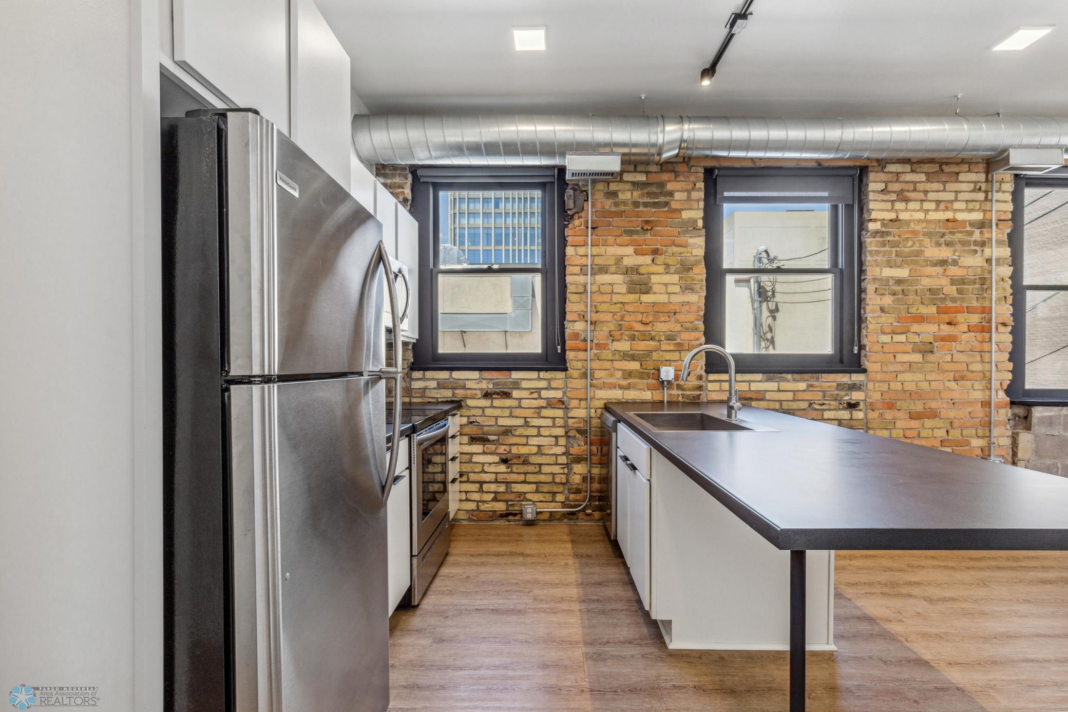 1911 condo for sale at 117 Broadway N, Unit 209 in Fargo, ND — 1 bed, 1 bath (photo 6 of 46)