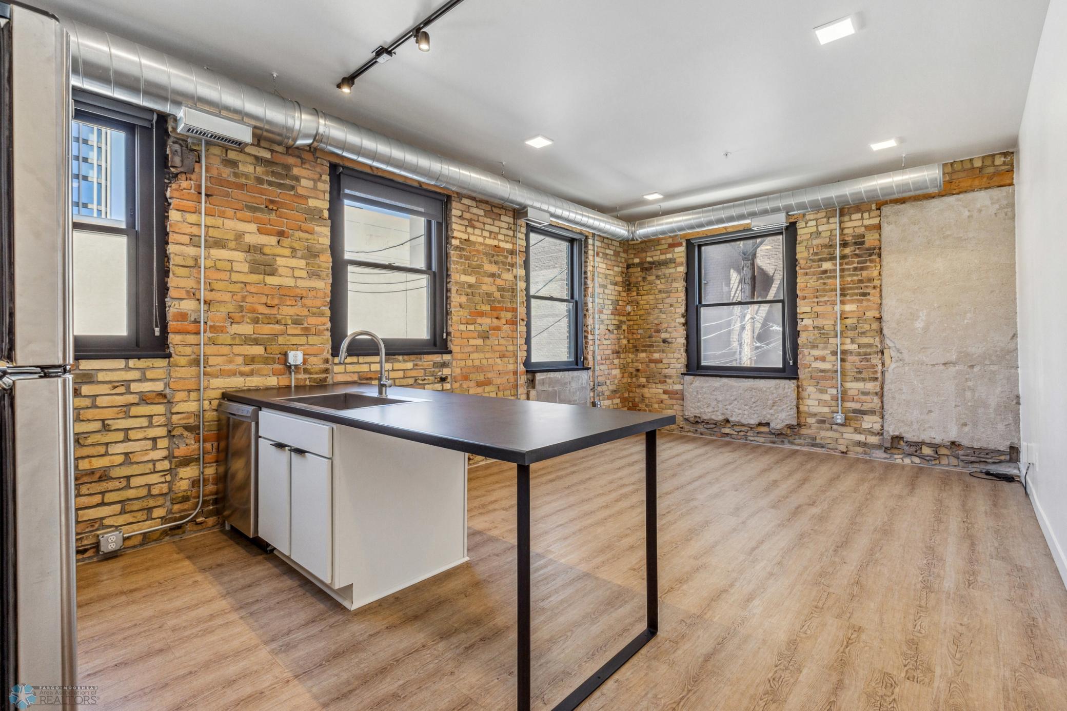 1911 condo for sale at 117 Broadway N, Unit 209 in Fargo, ND — 1 bed, 1 bath (photo 7 of 46)