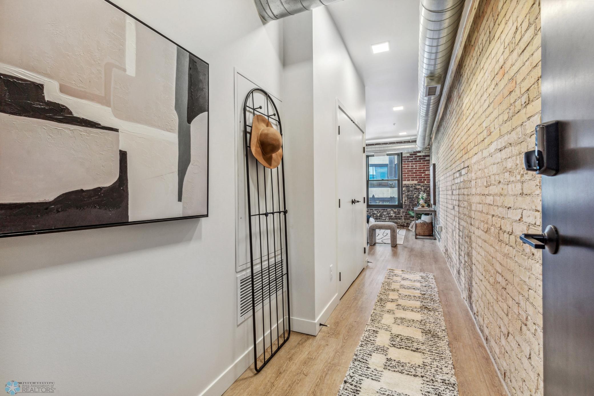1911 condo for sale at 117 Broadway N, Unit 203 in Fargo, ND — 1 bed, 1 bath (photo 2 of 56)