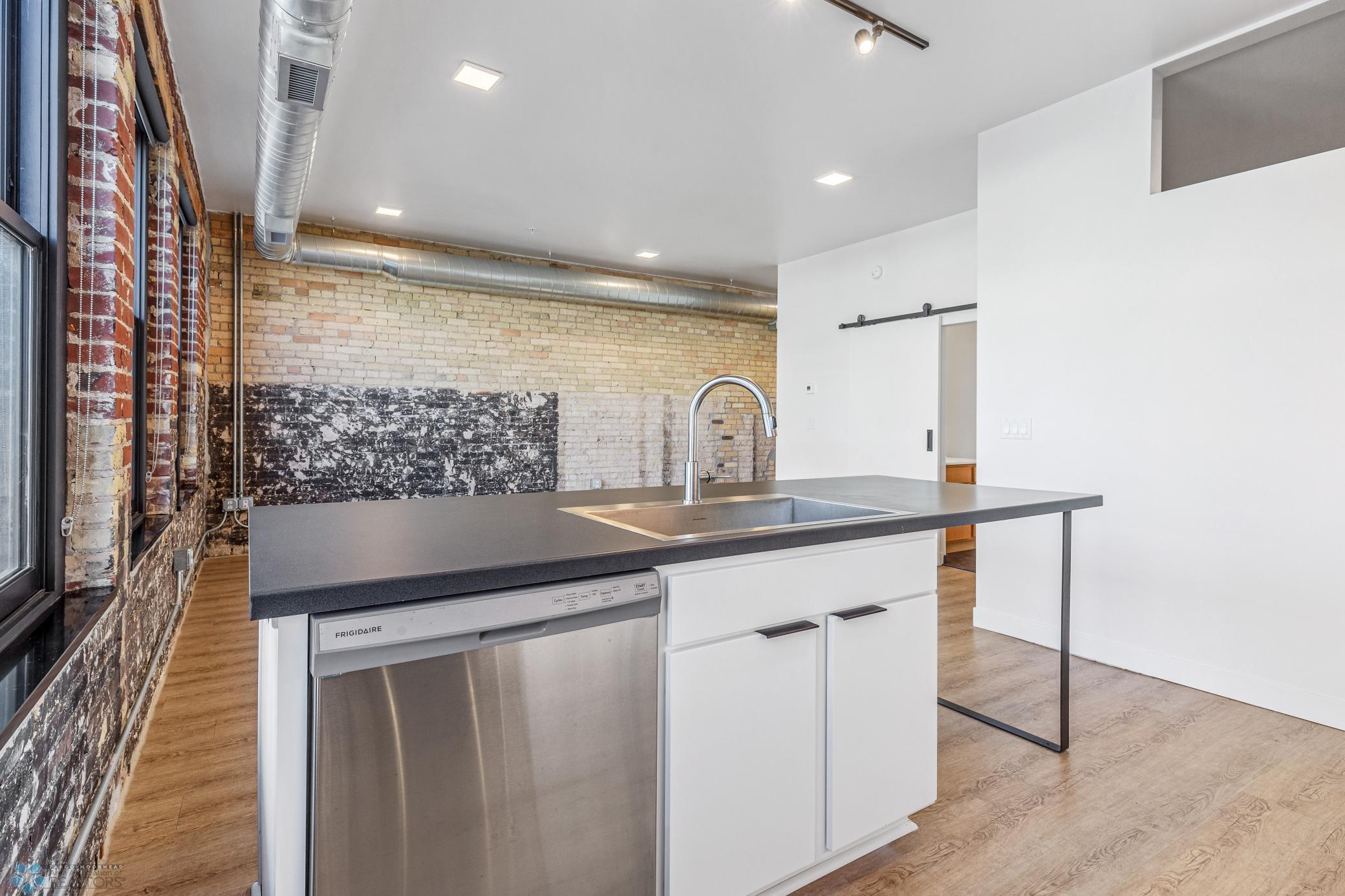1911 condo for sale at 117 Broadway N, Unit 203 in Fargo, ND — 1 bed, 1 bath (photo 11 of 56)