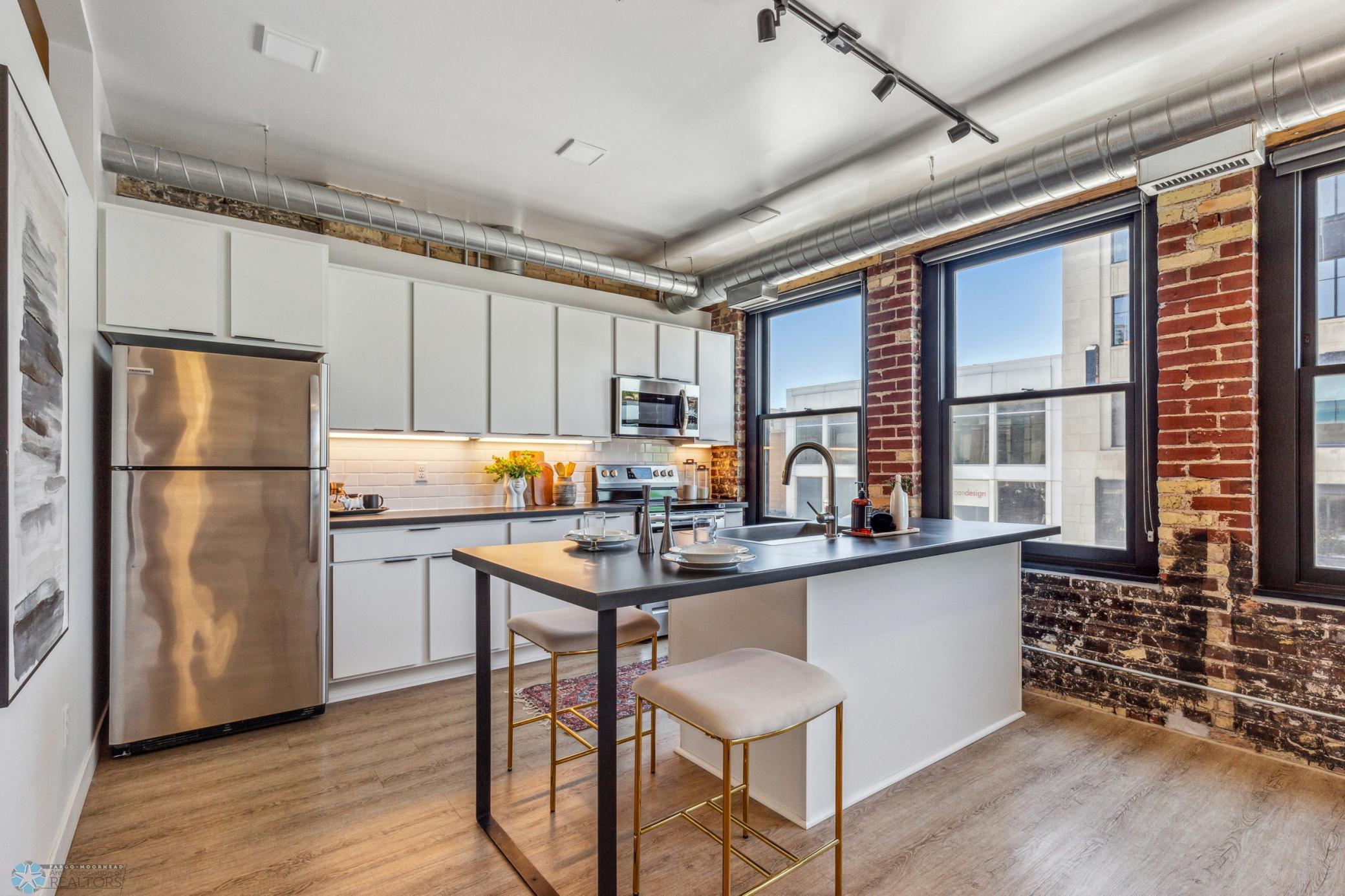 1911 condo for sale at 117 Broadway N, Unit 203 in Fargo, ND — 1 bed, 1 bath (photo 6 of 56)