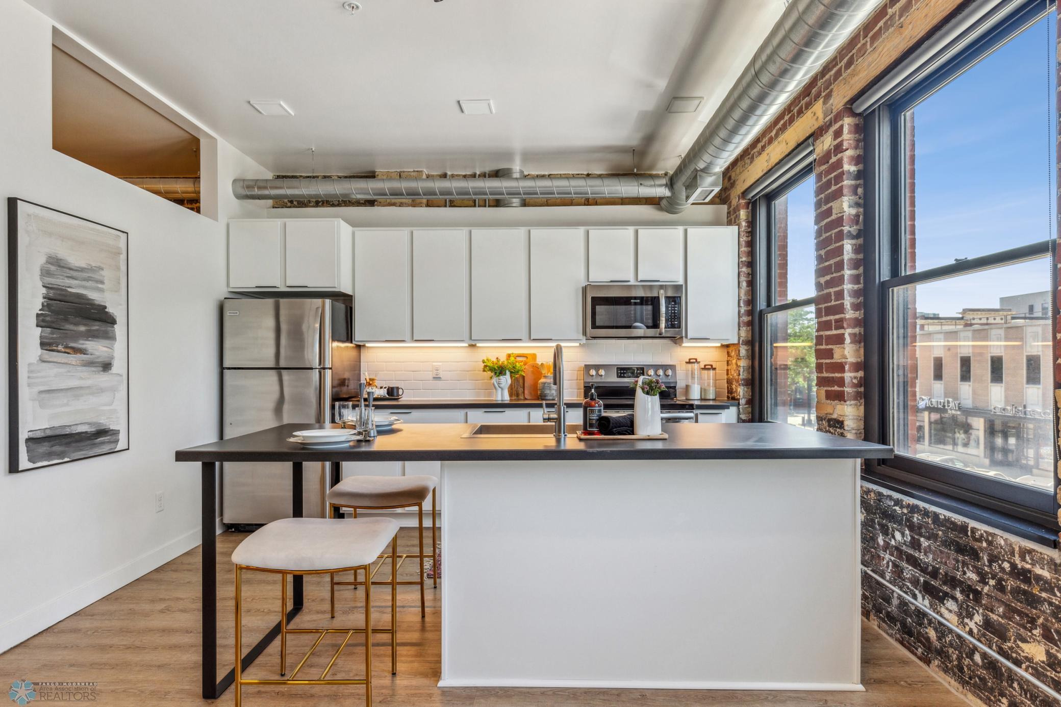1911 condo for sale at 117 Broadway N, Unit 203 in Fargo, ND — 1 bed, 1 bath (photo 7 of 56)