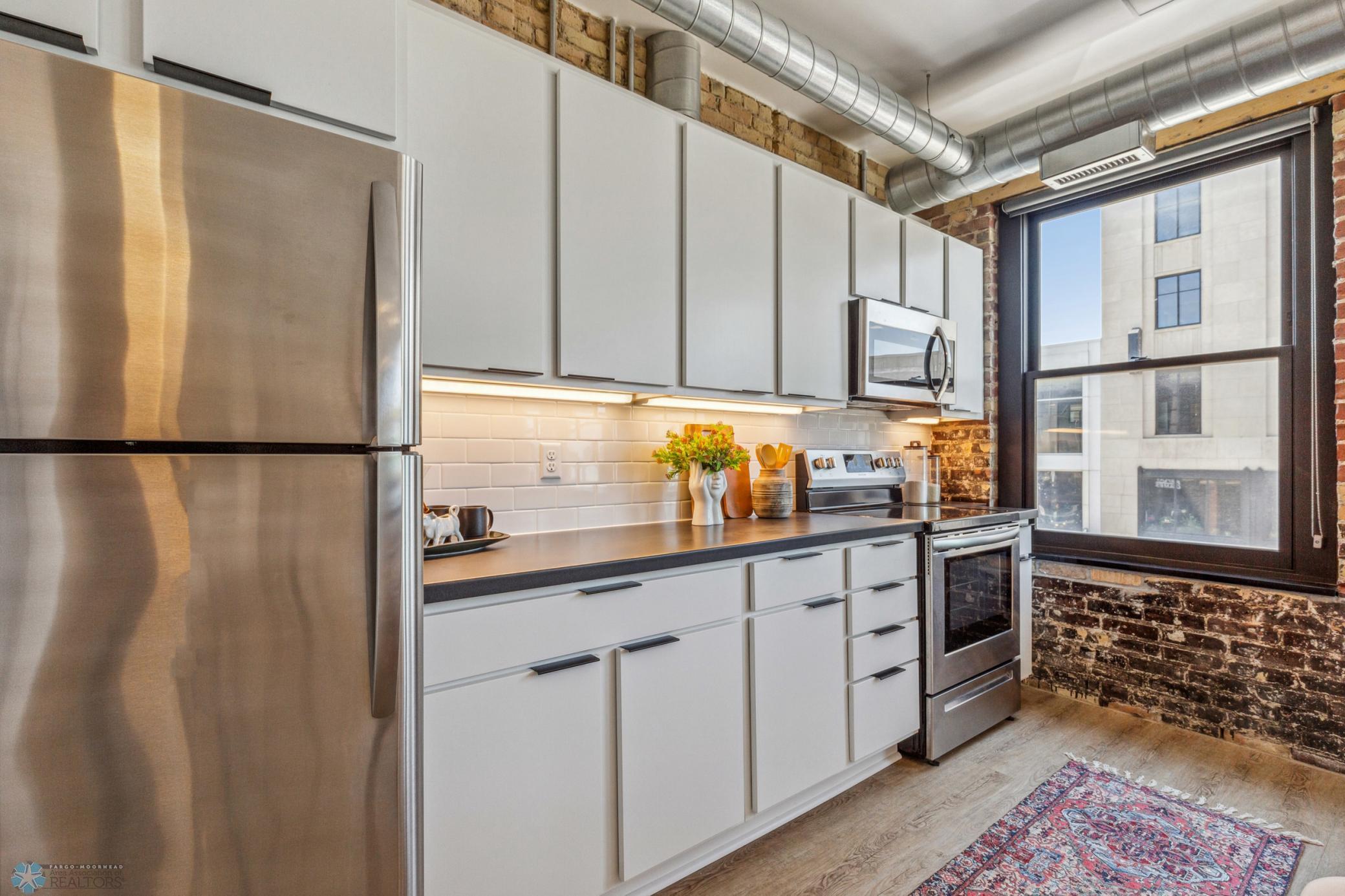 1911 condo for sale at 117 Broadway N, Unit 203 in Fargo, ND — 1 bed, 1 bath (photo 8 of 56)