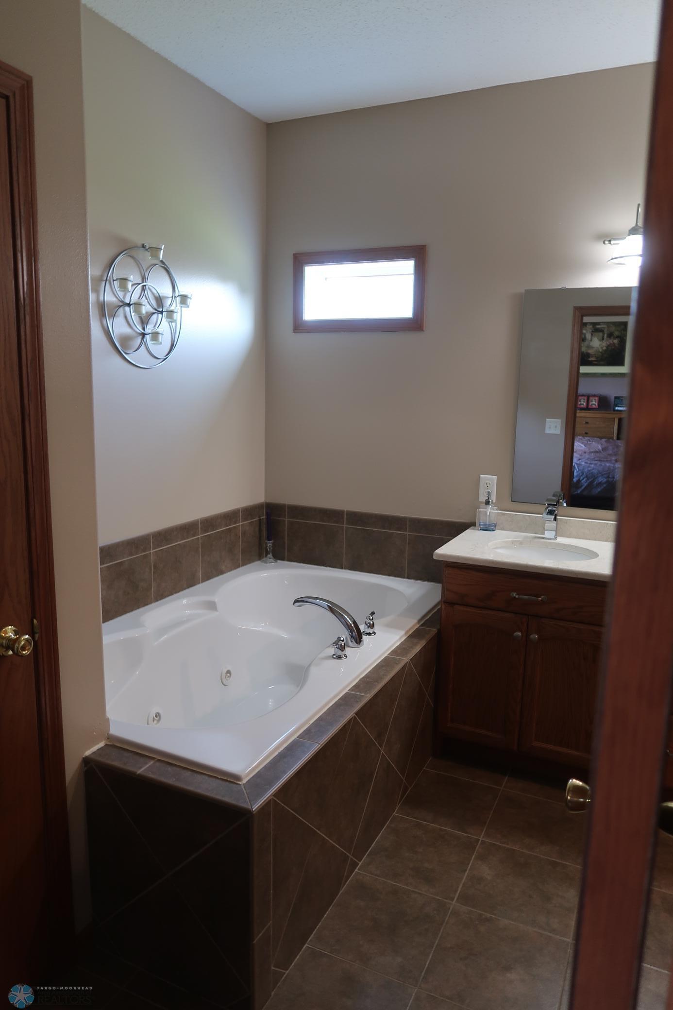 2007 single family home for sale at 1101 Southcreek Avenue in Glyndon, MN — 5 bed, 4 bath (photo 35 of 58)