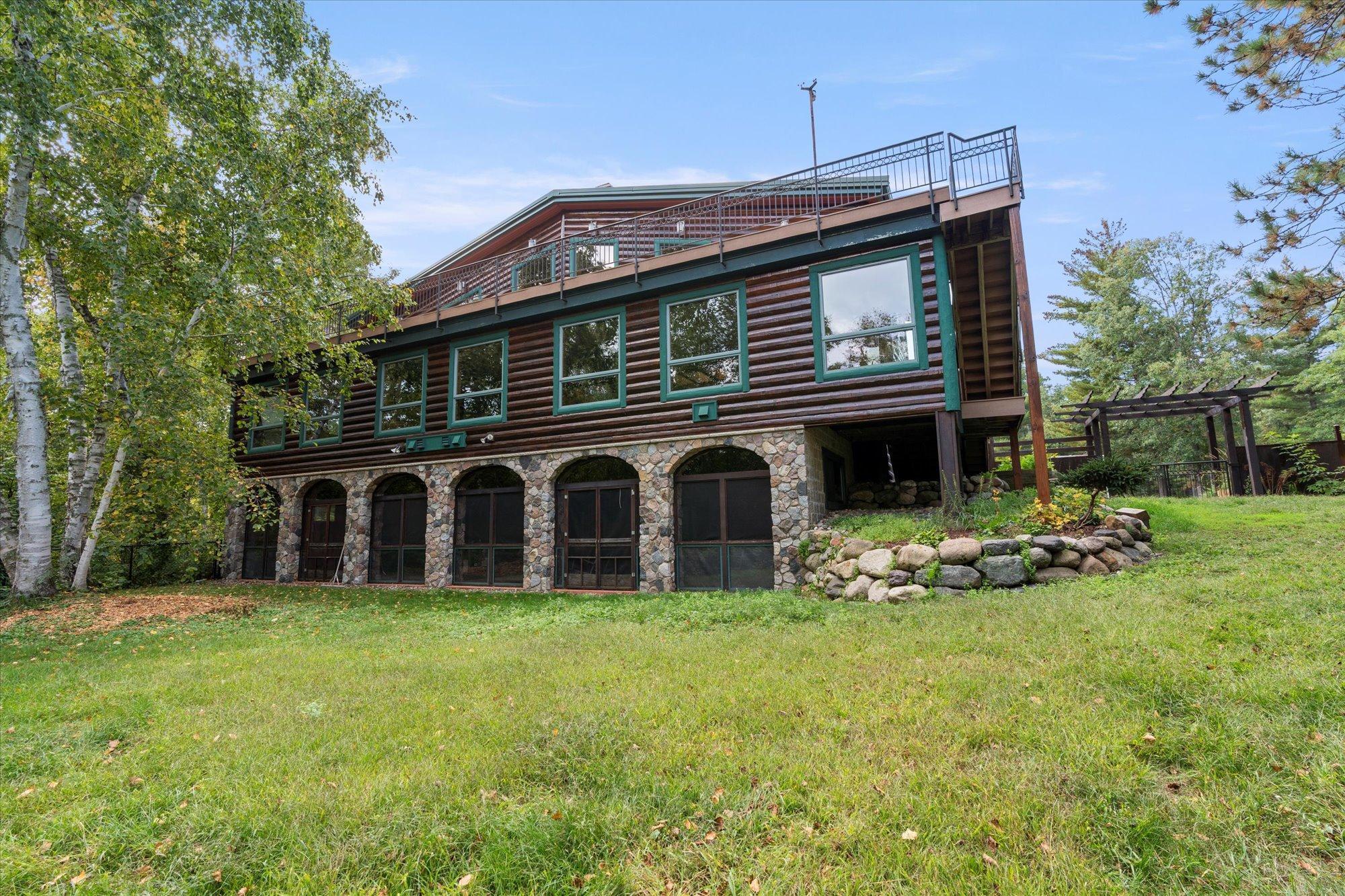 2002 single family home for sale at 10422 Ossawinnamakee Road in Pequot Lakes, MN — 3 bed, 5 bath (photo 2 of 66)