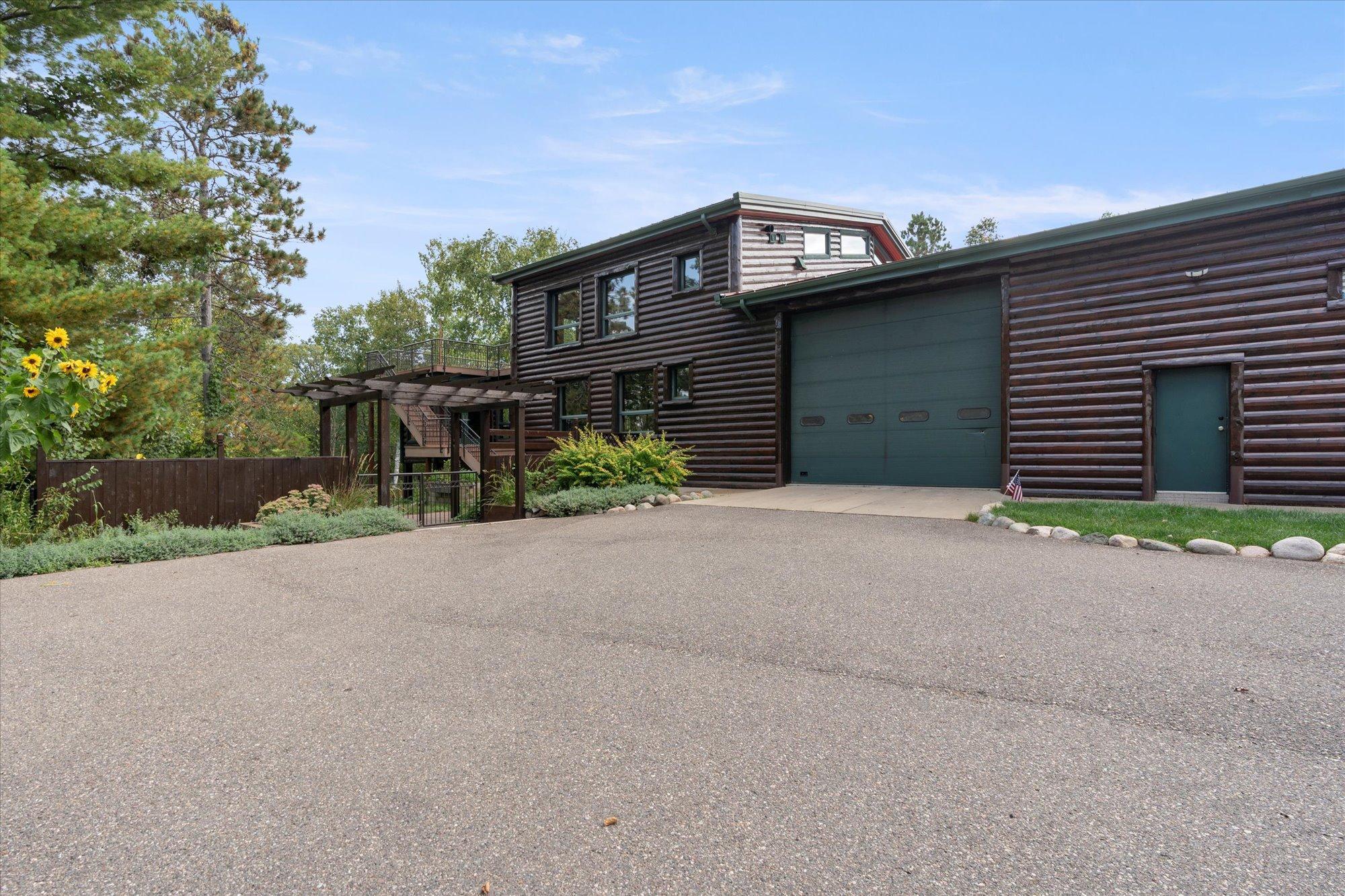 2002 single family home for sale at 10422 Ossawinnamakee Road in Pequot Lakes, MN — 3 bed, 5 bath