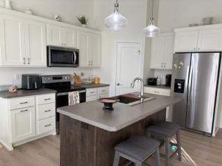 2023 townhouse for sale at 1037 Village Lane in Detroit Lakes, MN — 2 bed, 2 bath (photo 9 of 25)