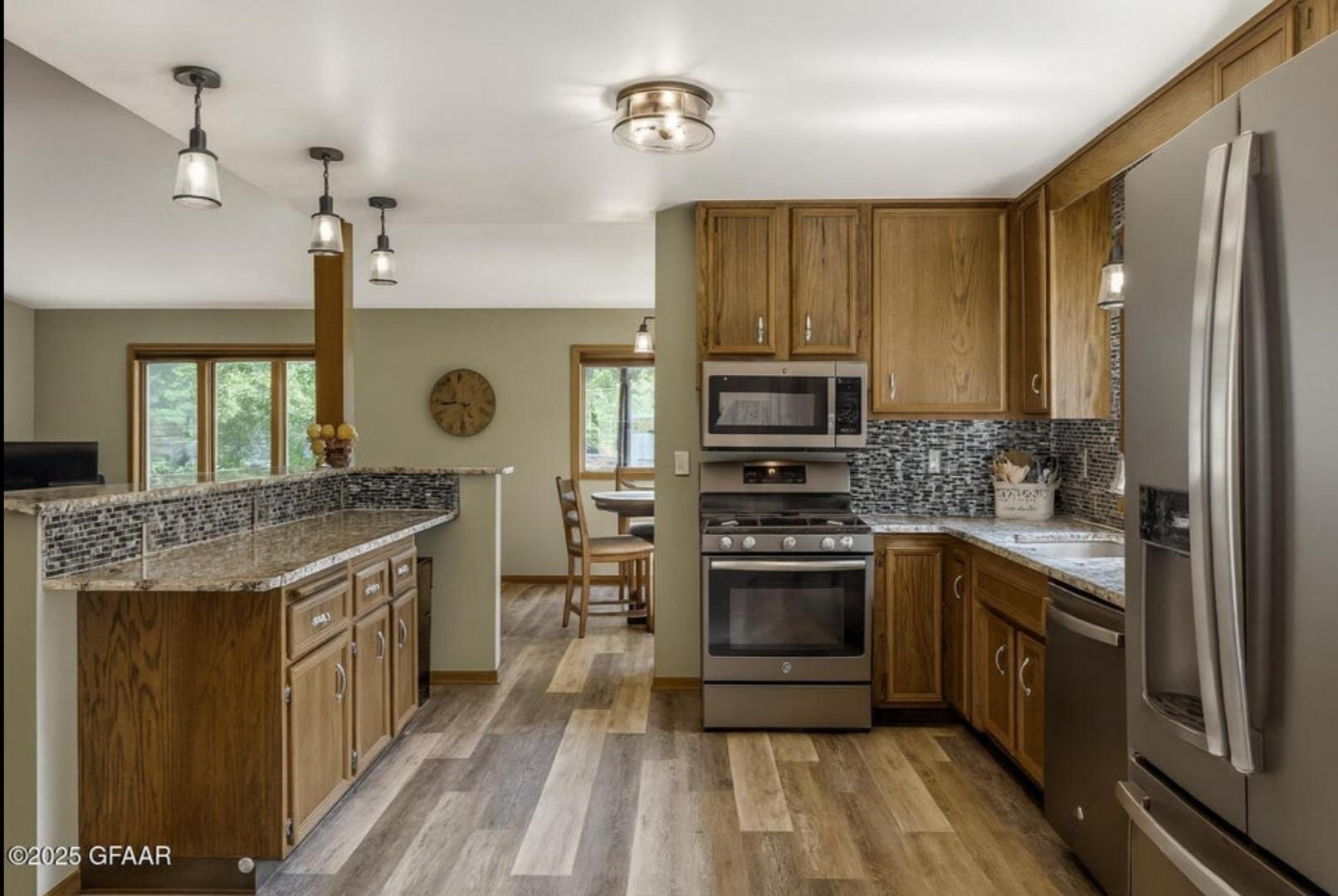 1976 single family home for sale at 3402 Par Street N in Fargo, ND — 3 bed, 2 bath (photo 9 of 21)
