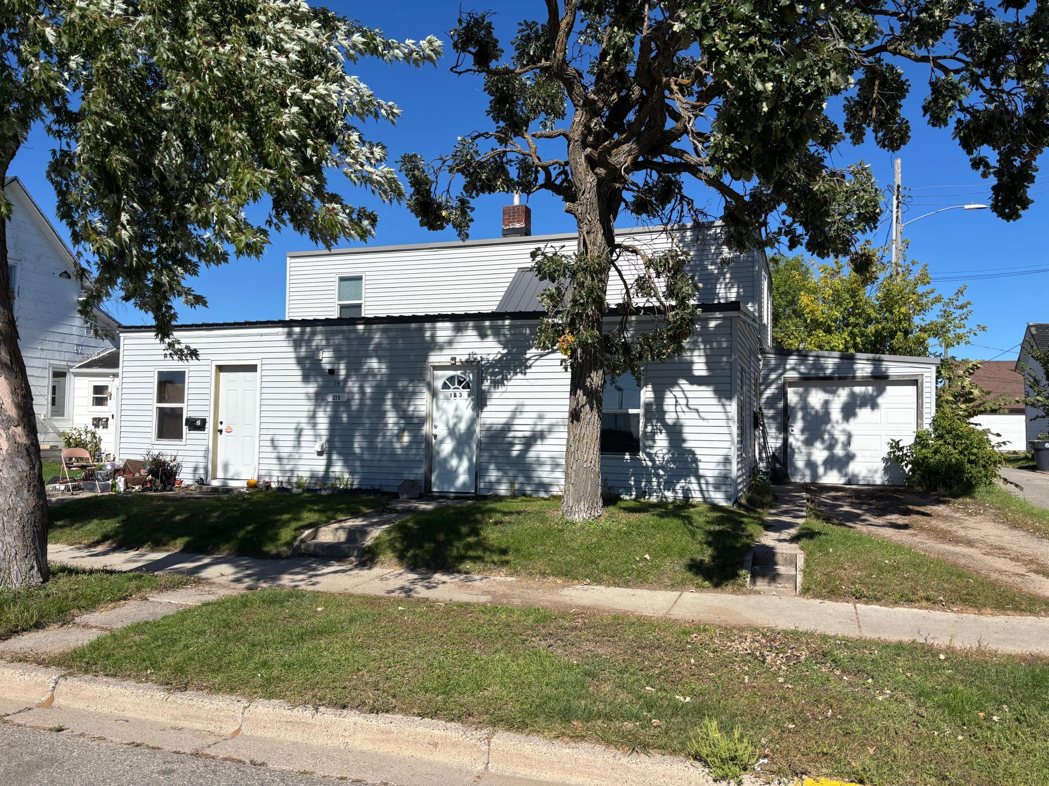 1920 triplex for sale at 215 9th Street NW in Bemidji, MN — 6 bed, 3 bath