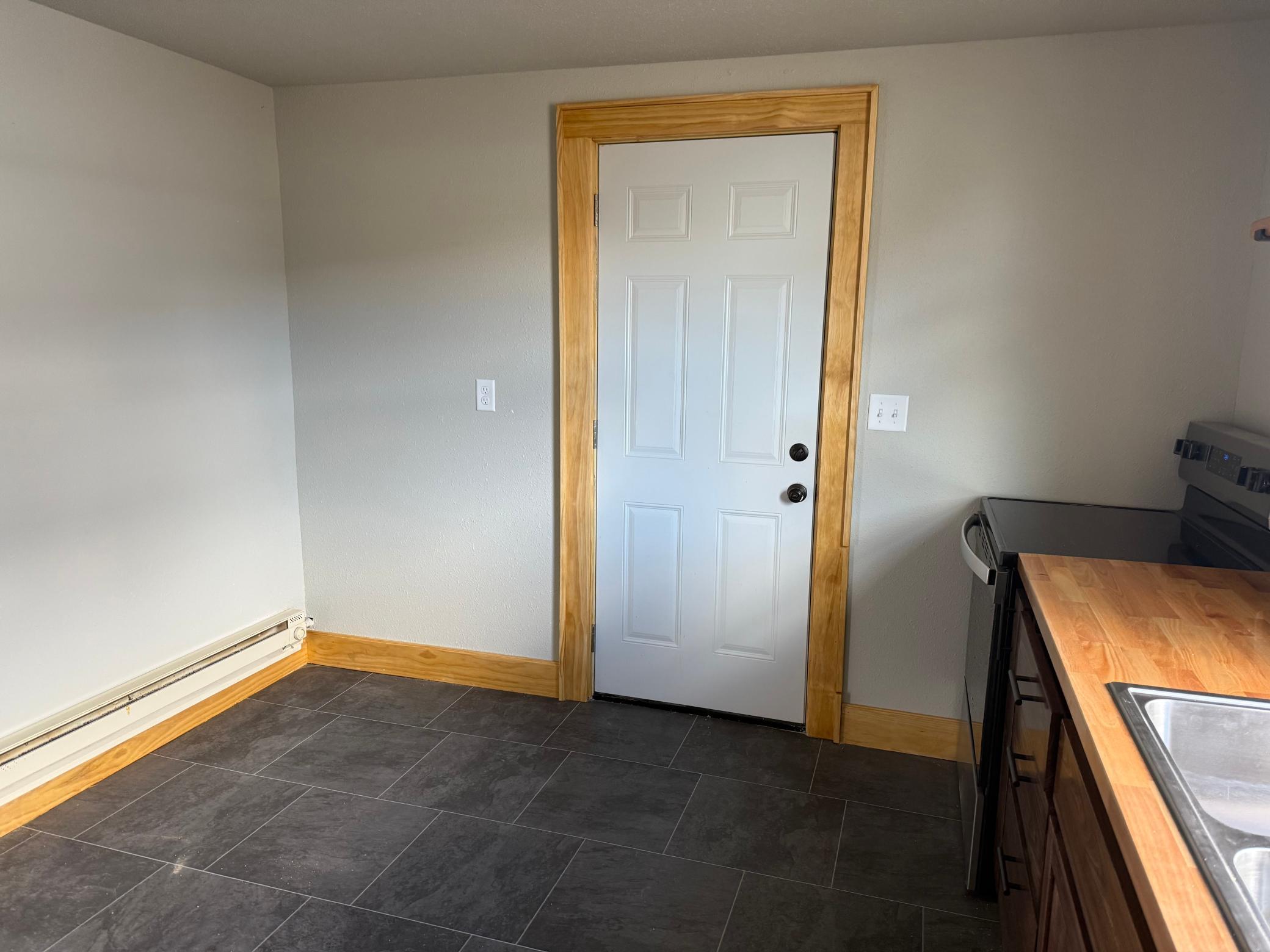 1920 triplex for sale at 215 9th Street NW in Bemidji, MN — 6 bed, 3 bath (photo 11 of 31)
