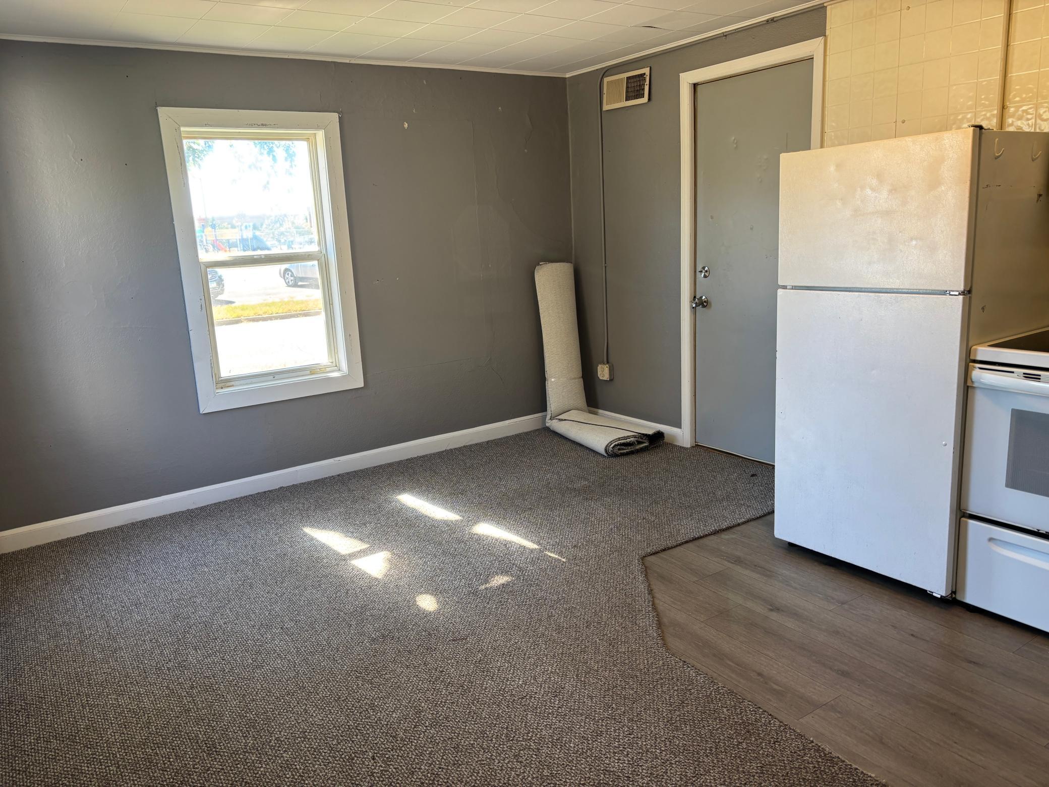 1920 triplex for sale at 215 9th Street NW in Bemidji, MN — 6 bed, 3 bath (photo 3 of 31)