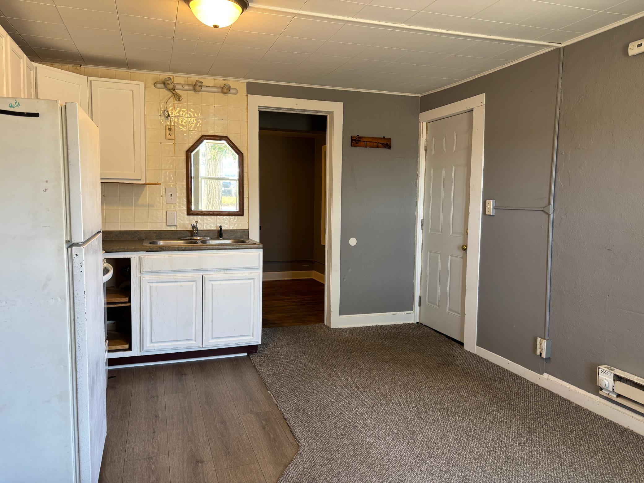 1920 triplex for sale at 215 9th Street NW in Bemidji, MN — 6 bed, 3 bath (photo 5 of 31)