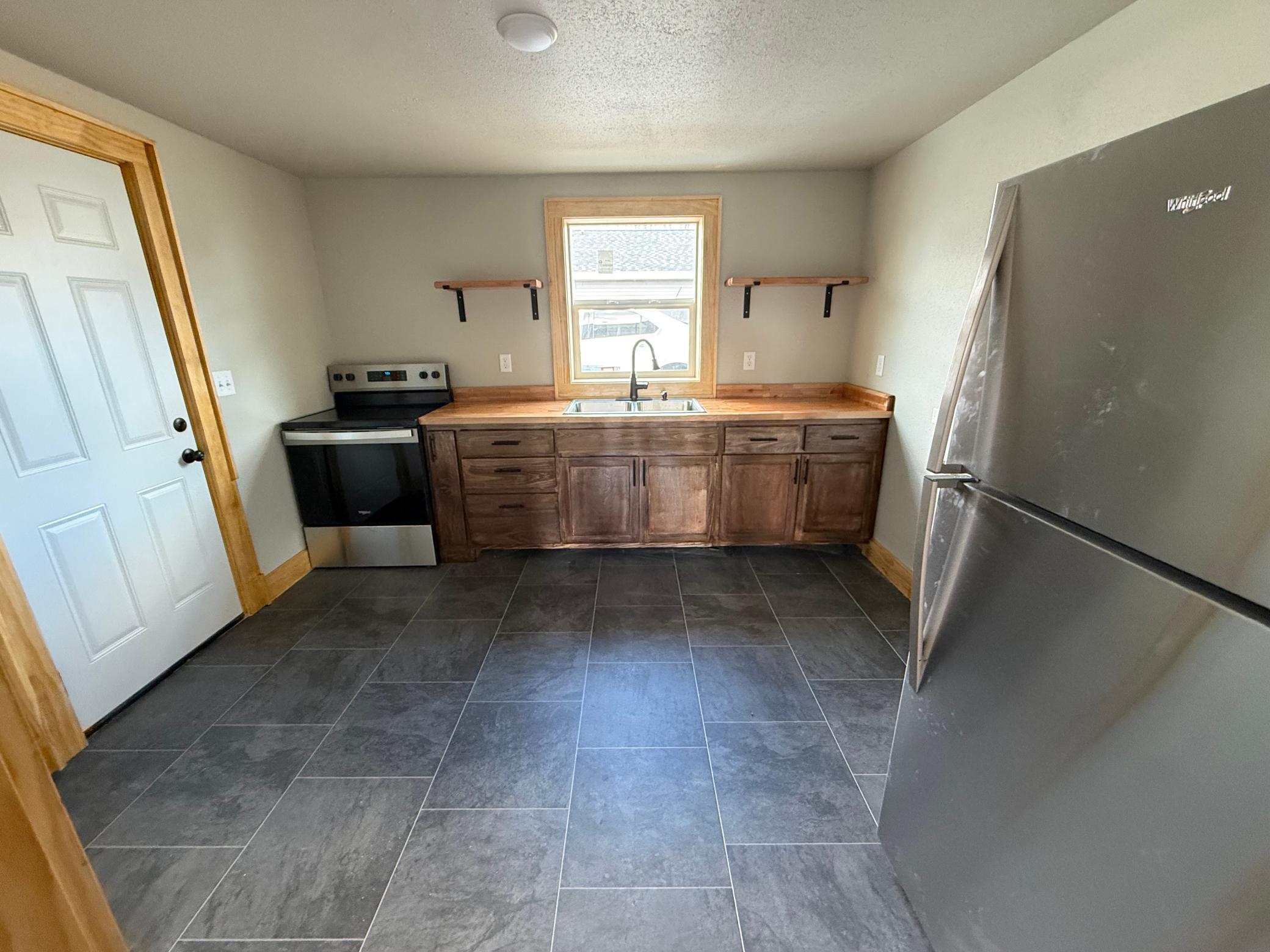 1920 triplex for sale at 215 9th Street NW in Bemidji, MN — 6 bed, 3 bath (photo 9 of 31)