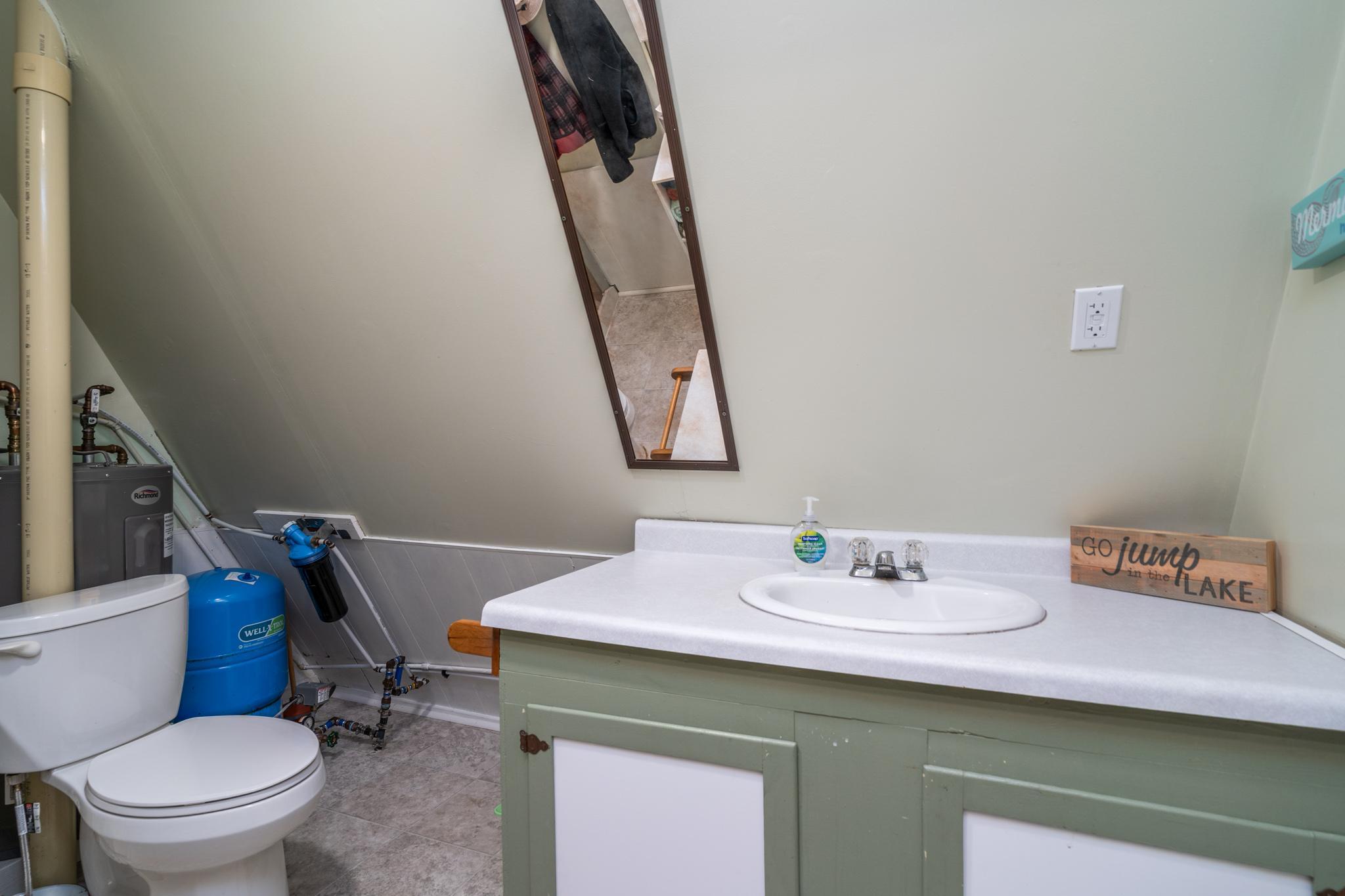1973 single family home for sale at 15710 N Trinity Point Road SE in Mentor, MN — 1 bed, 1 bath (photo 9 of 39)