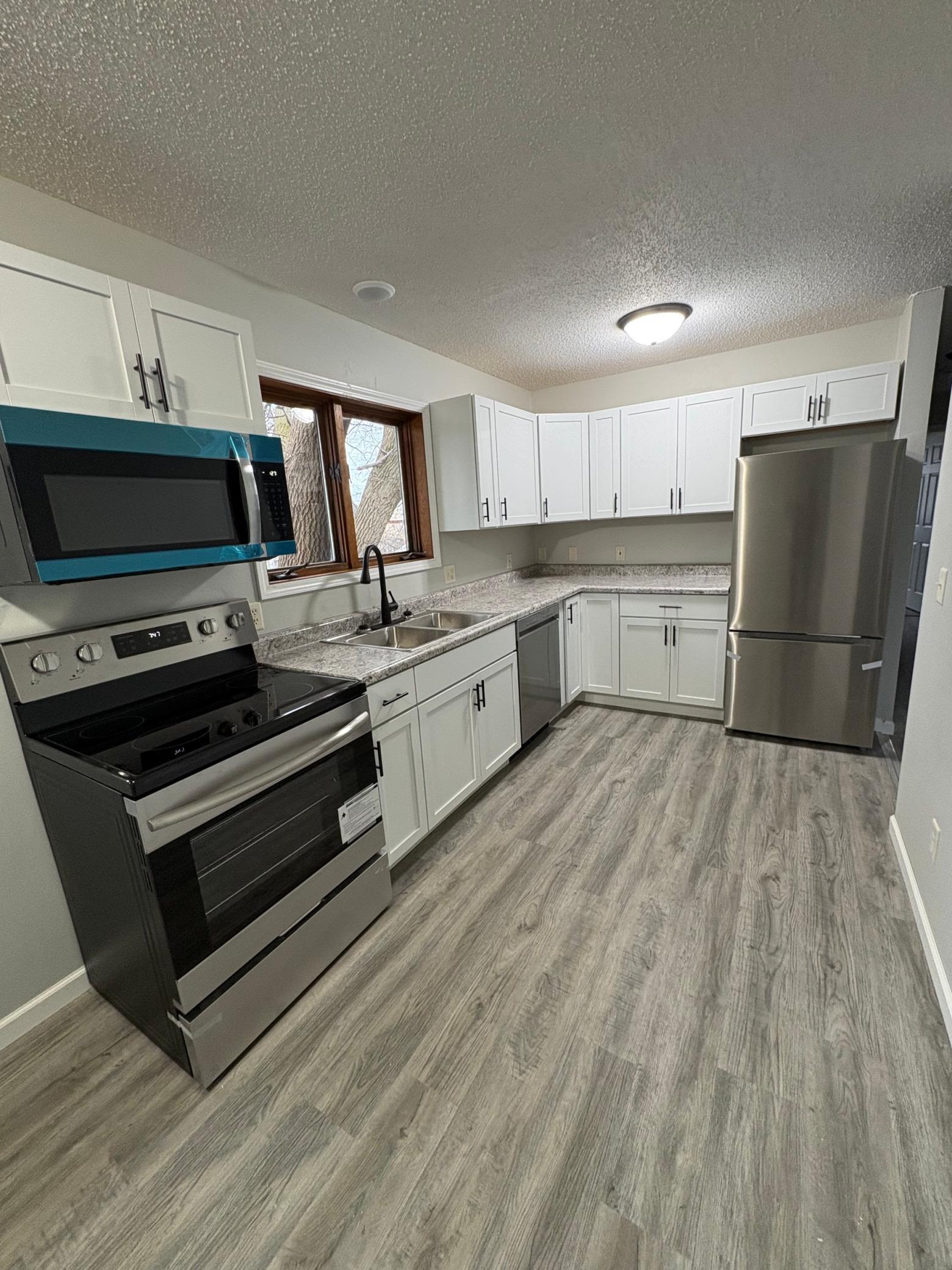 1999 single family home for sale at 506 7th Avenue NE in Brainerd, MN — 4 bed, 2 bath (photo 4 of 19)