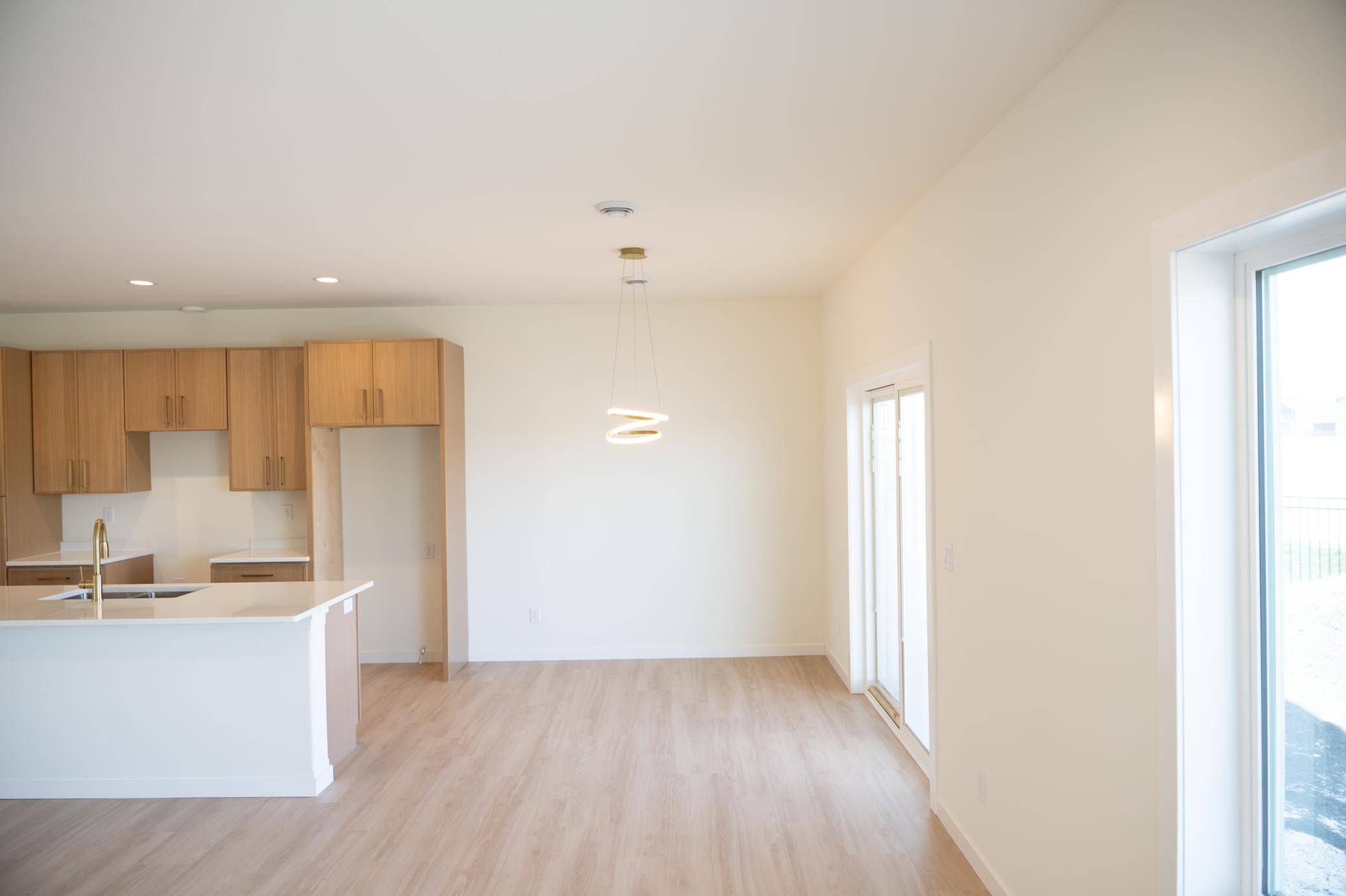 2026 single family home for sale at 1002 Albert Drive W in West Fargo, ND — 3 bed, 3 bath (photo 4 of 13)