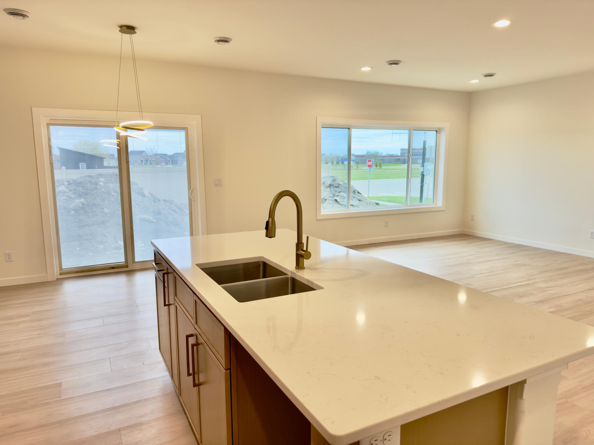 2026 single family home for sale at 1002 Albert Drive W in West Fargo, ND — 3 bed, 3 bath (photo 7 of 13)