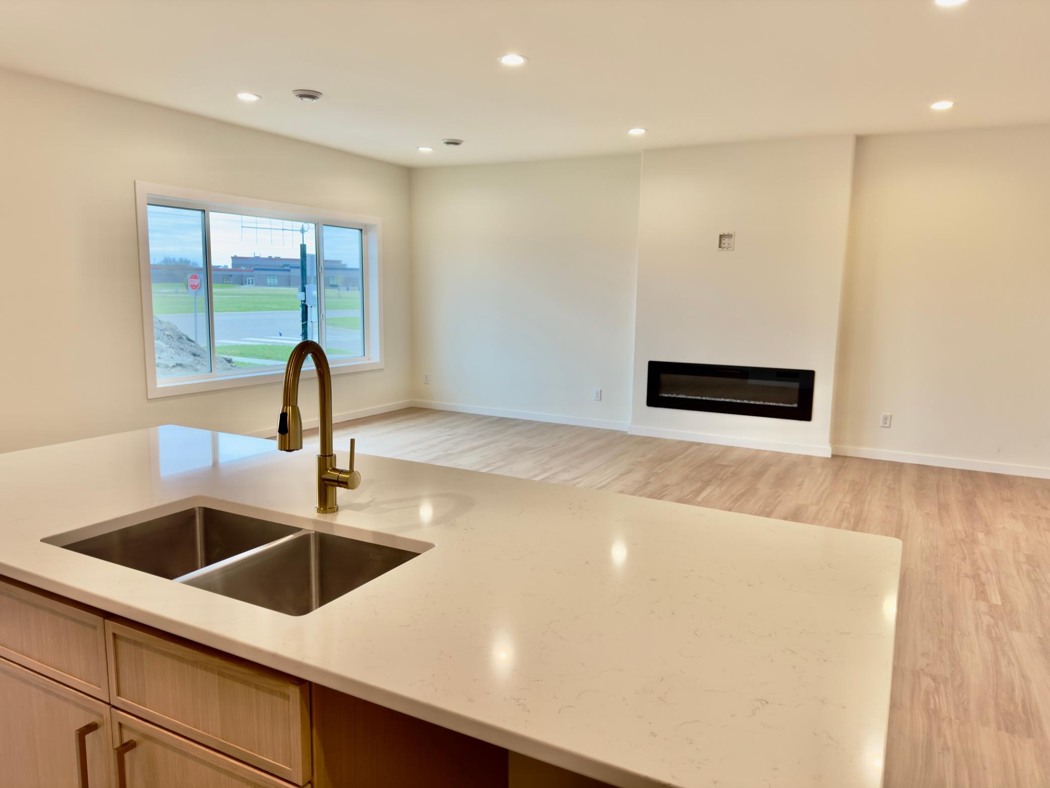 2026 single family home for sale at 1002 Albert Drive W in West Fargo, ND — 3 bed, 3 bath (photo 8 of 13)