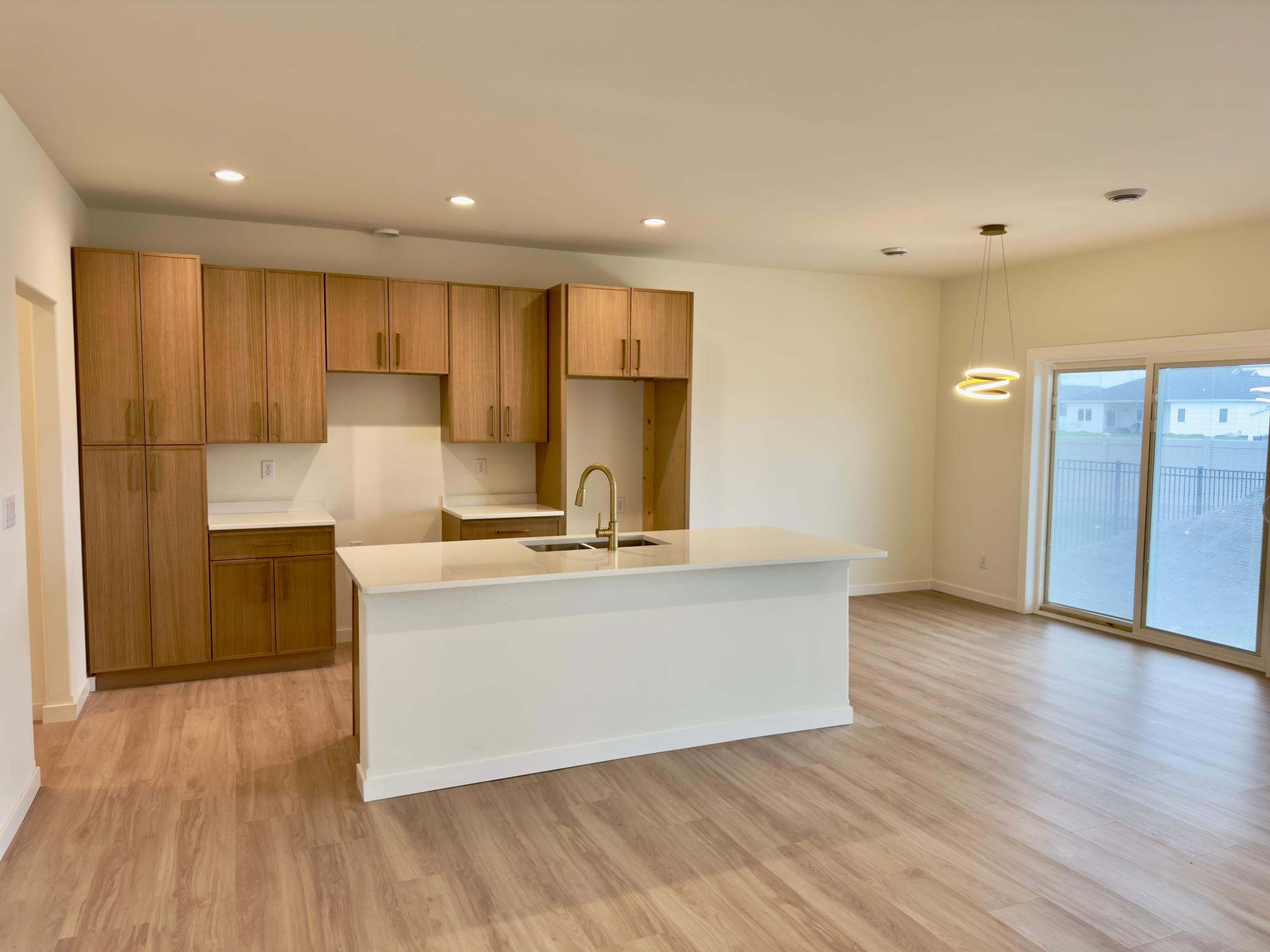 2026 single family home for sale at 1002 Albert Drive W in West Fargo, ND — 3 bed, 3 bath (photo 9 of 13)