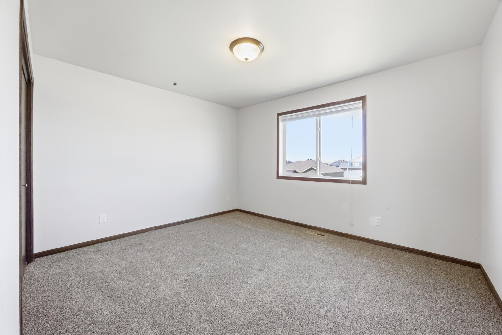 1206 Commander Drive W, West Fargo ND 58078 - Photo 16 of 32
