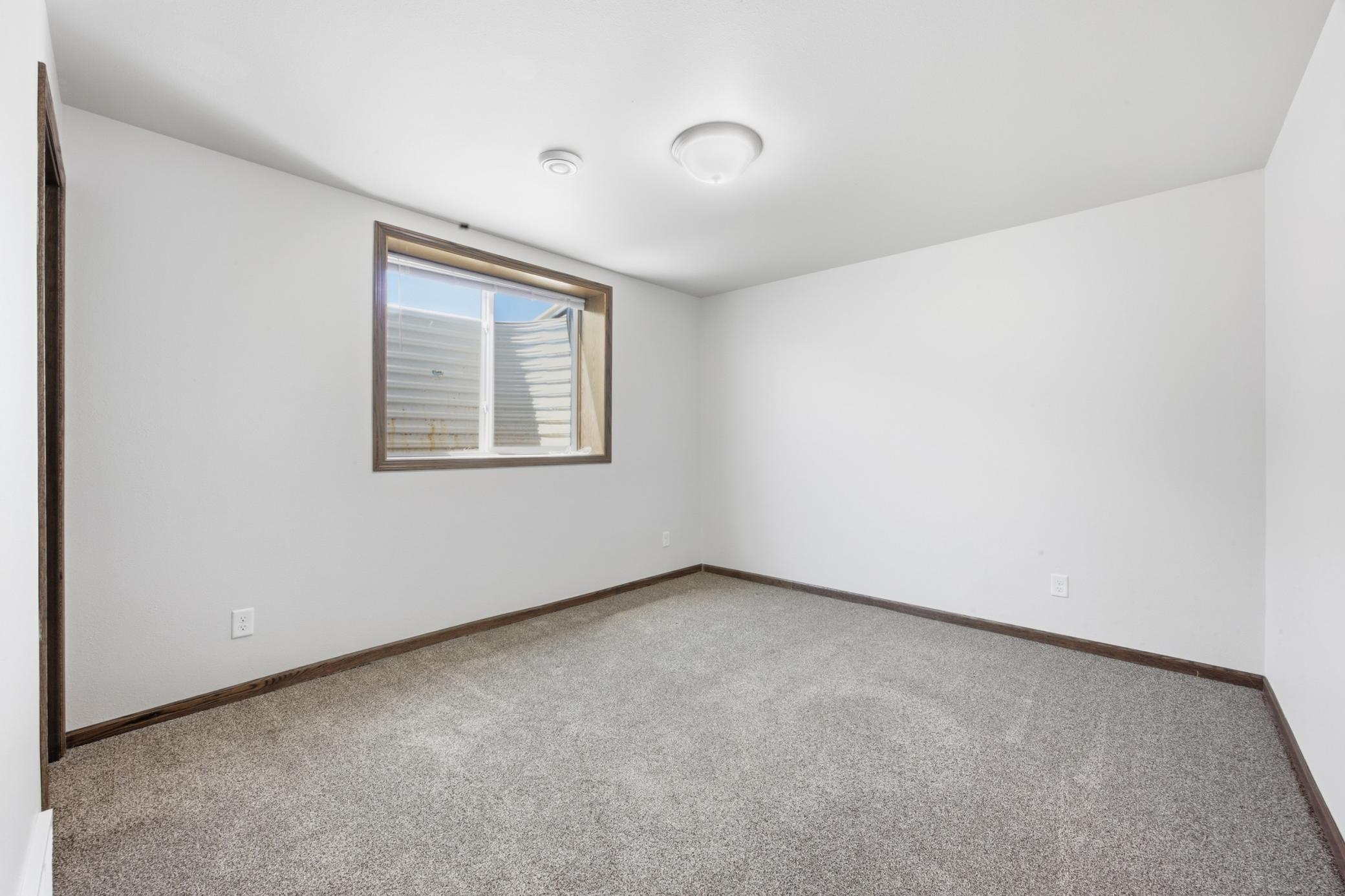 1206 Commander Drive W, West Fargo ND 58078 - Photo 25 of 32