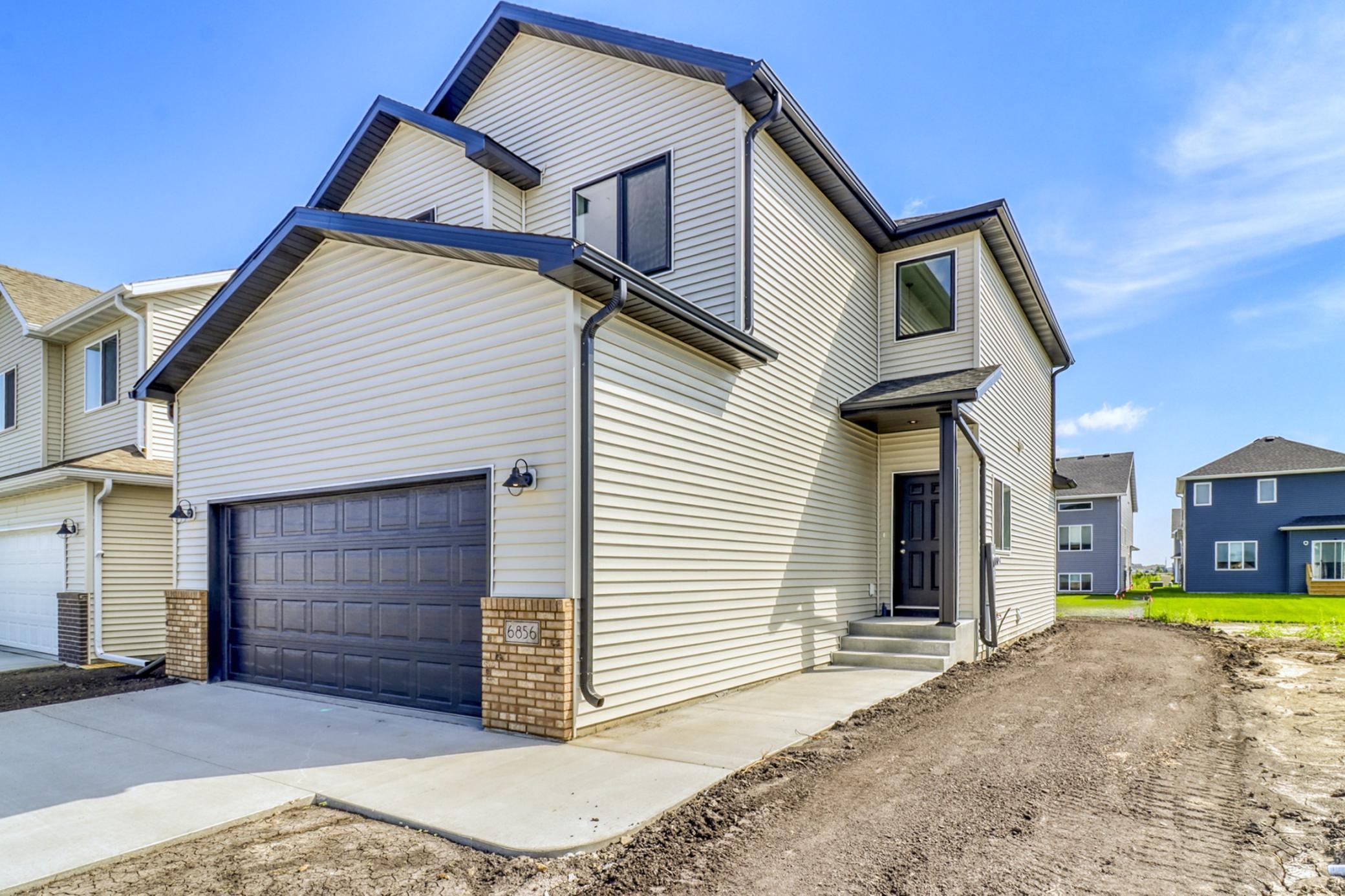 2026 single family home for sale at 6856 Belding Drive S in Fargo, ND — 4 bed, 3 bath (photo 2 of 43)