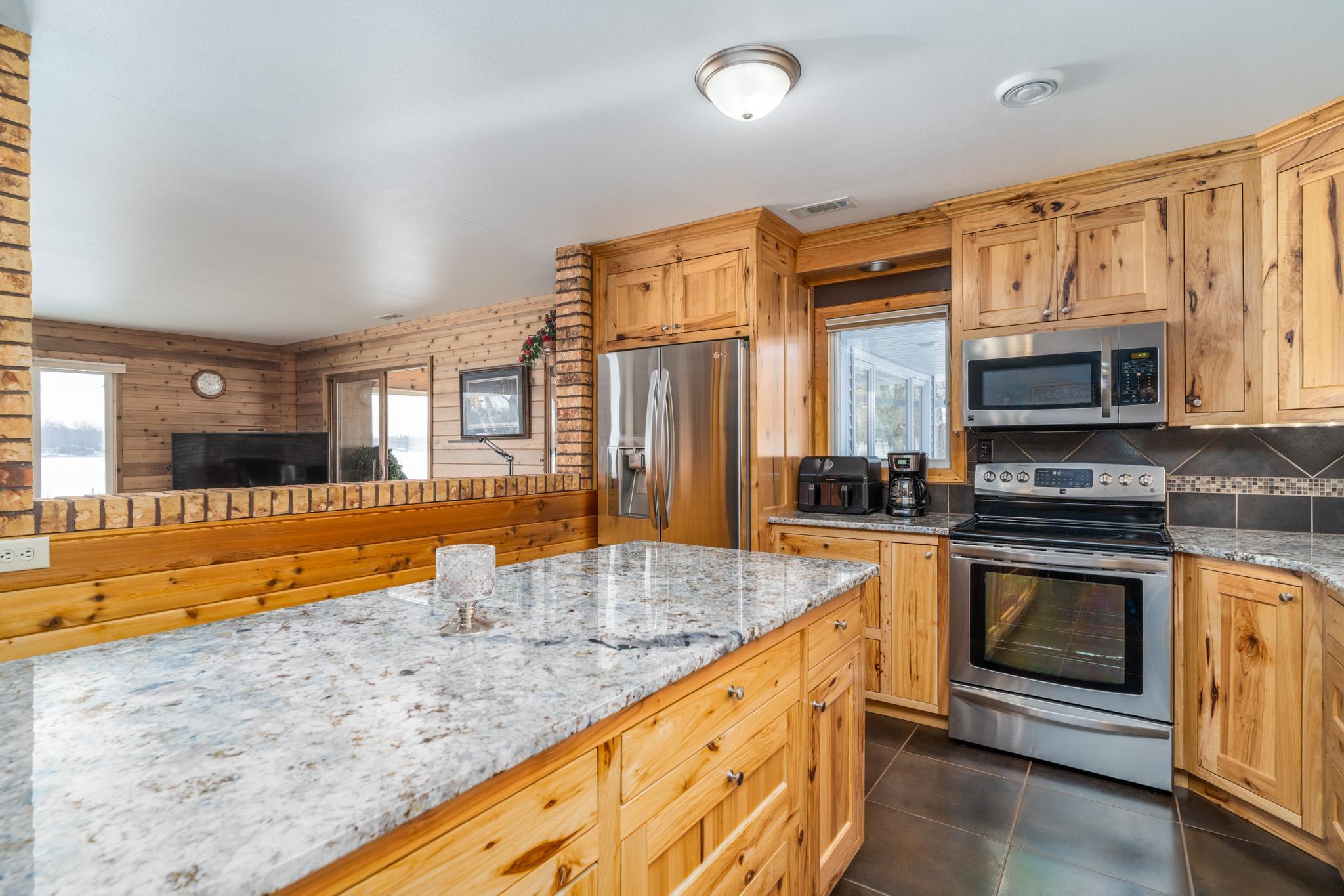1969 single family home for sale at 13233 Elmhurst Lane SE in Mentor, MN — 5 bed, 3 bath (photo 38 of 73)