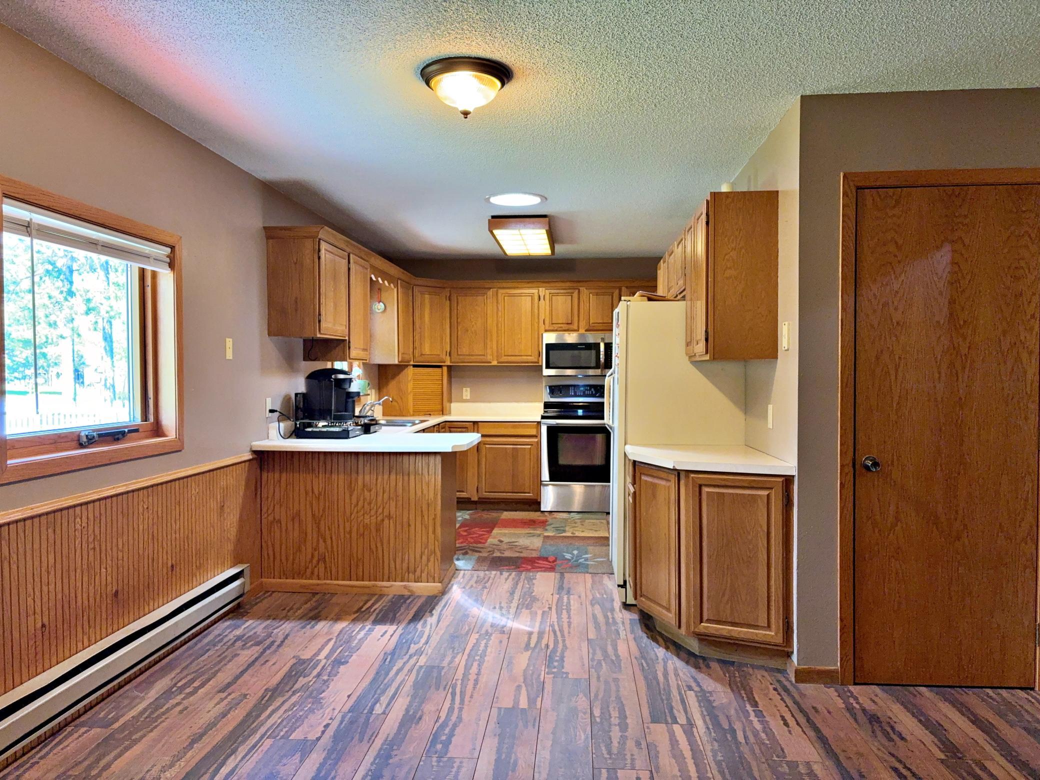 1990 single family home for sale at 702 Washington Avenue S in Park Rapids, MN — 3 bed, 2 bath (photo 6 of 22)